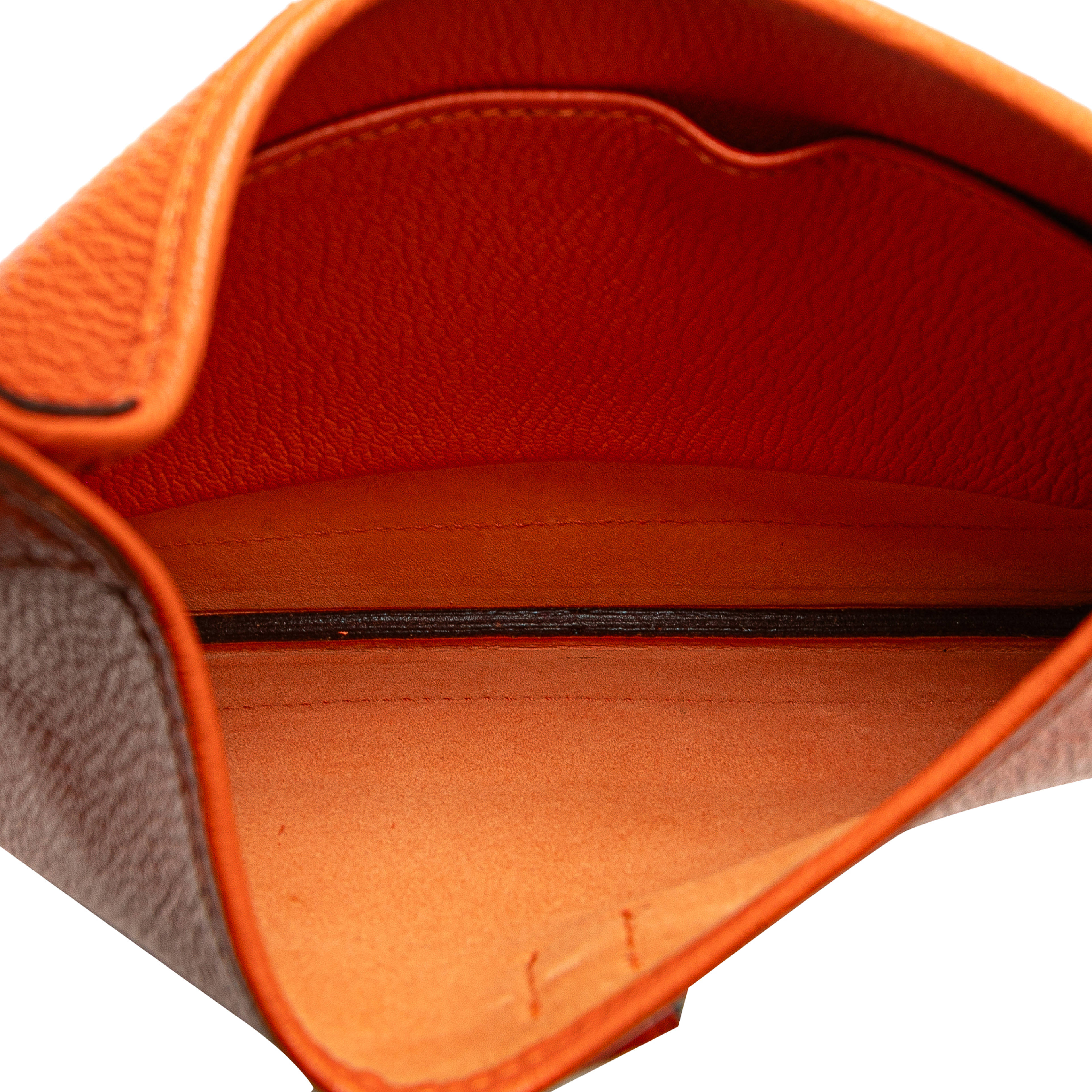 Hermès Clemence Trim Duo 24, från Luxclusif, i färgen orange. Klicka för att öppna bilden i stort format