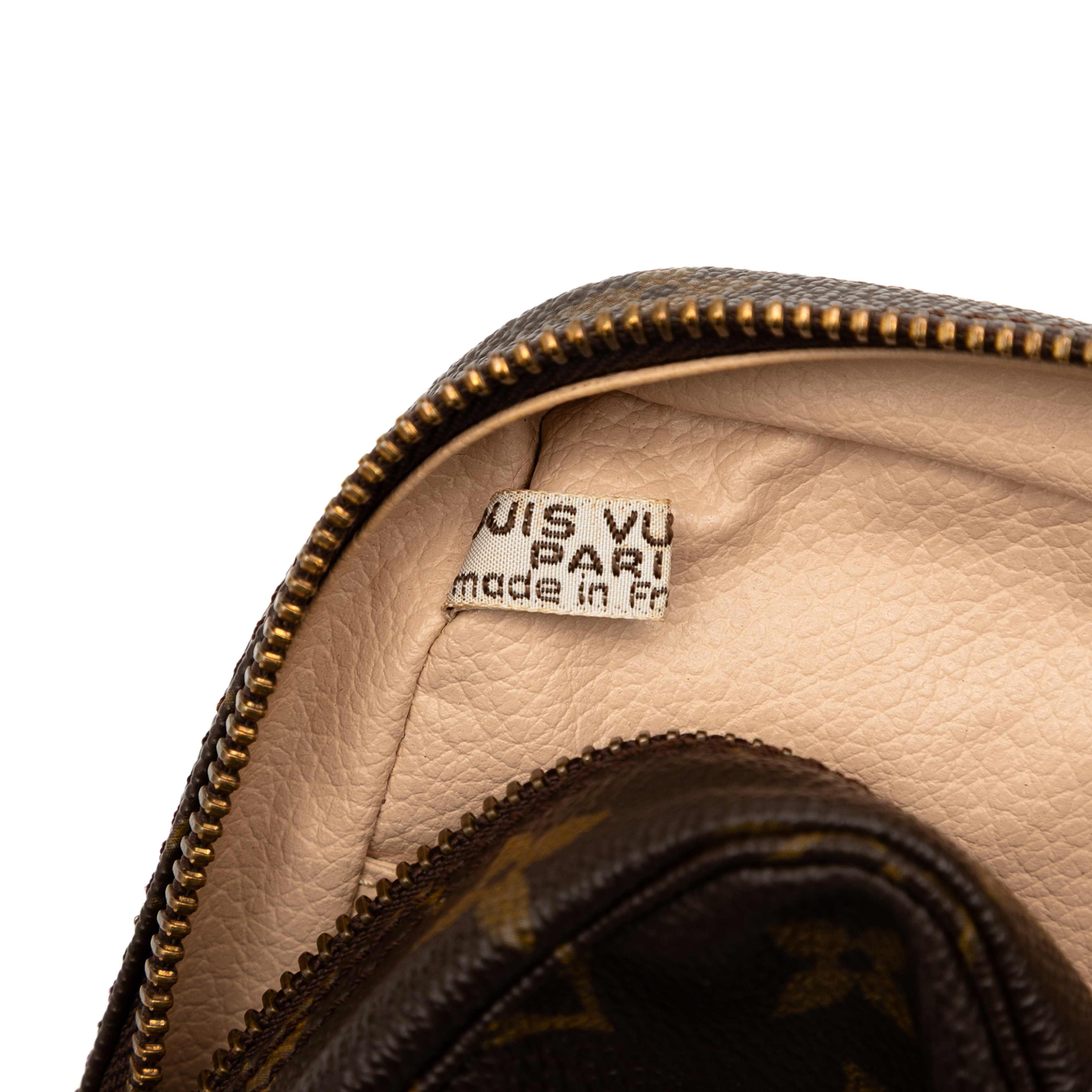 Louis Vuitton Monogram Trousse Toilette 23, från Luxclusif, i färgen brown. Klicka för att öppna bilden i stort format