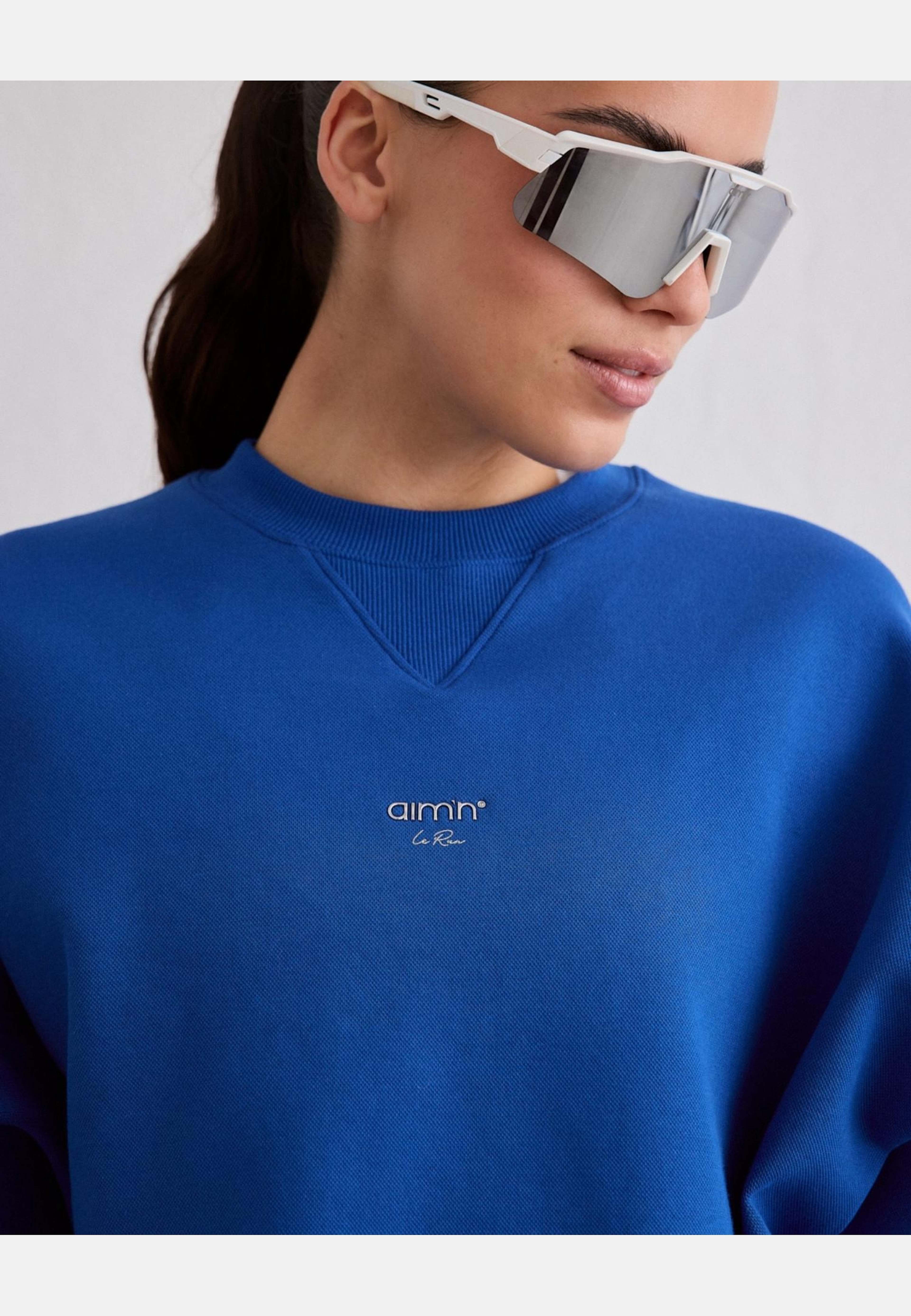 Le Run Running Sweatshirt, från aim'n, i färgen azure. Klicka för att öppna bilden i stort format
