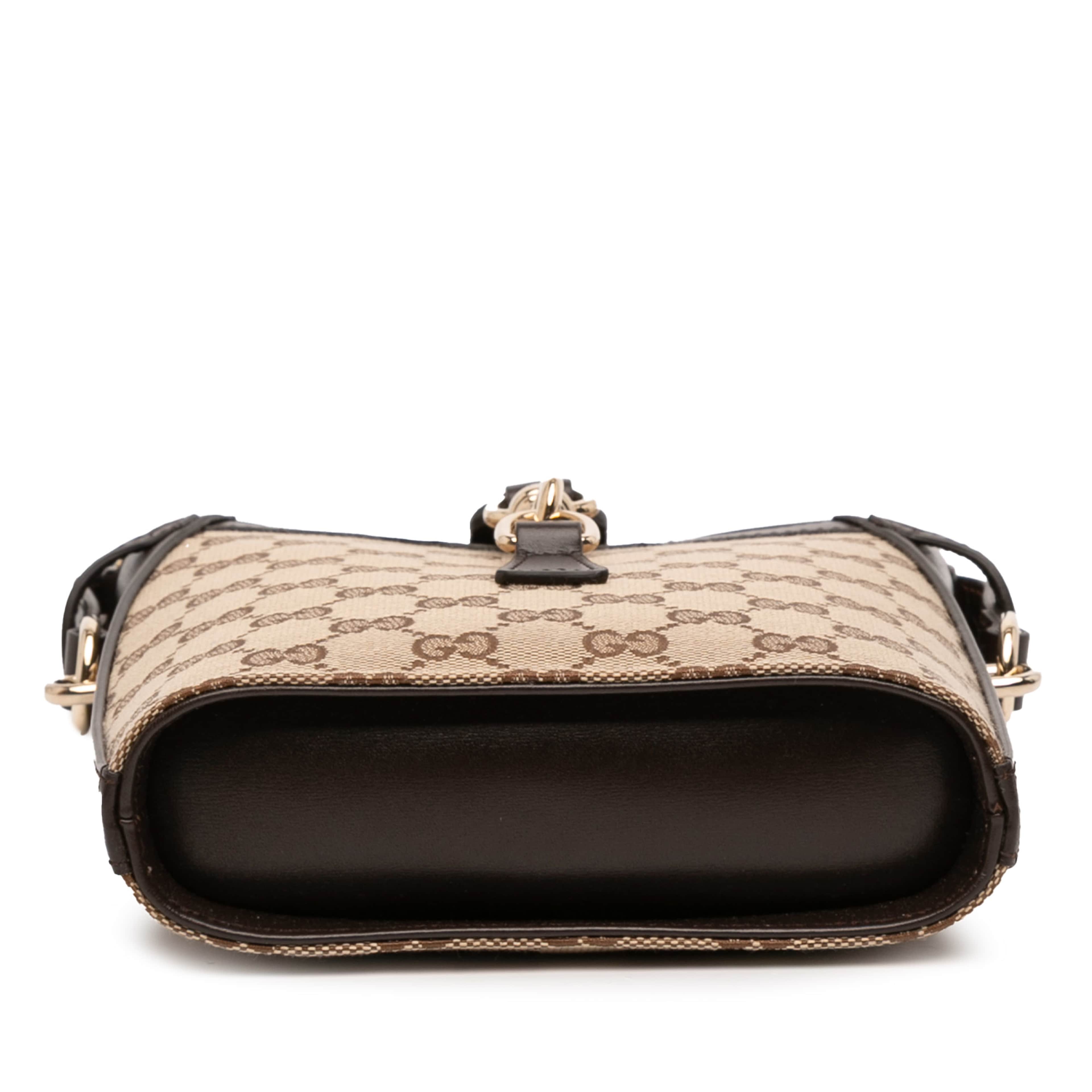 Gucci Mini Gg Canvas Web Bucket Bag, från Luxclusif, i färgen beige. Klicka för att öppna bilden i stort format