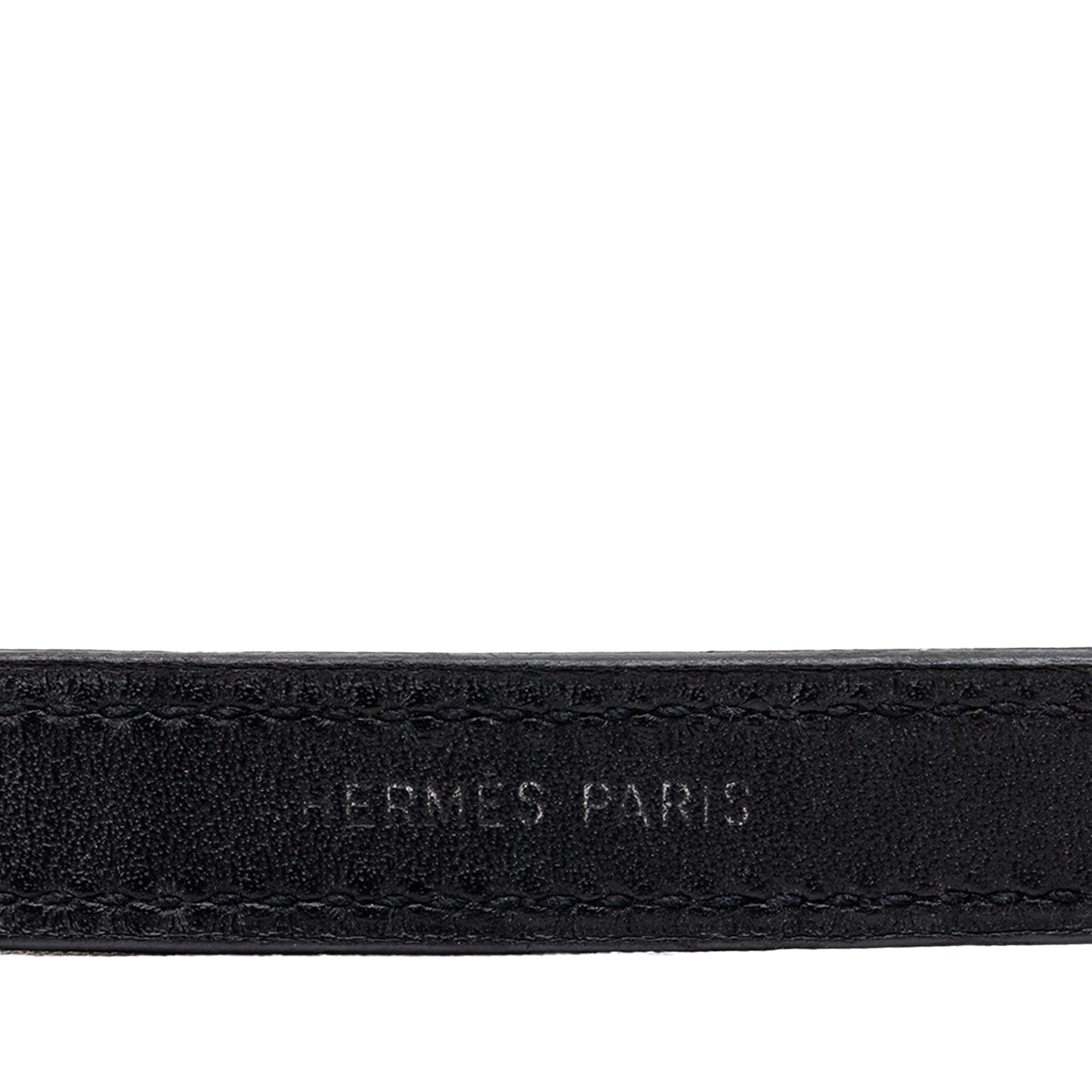 Hermès Swift Clou De Selle Looping Bracelet, från Luxclusif, i färgen black. Klicka för att öppna bilden i stort format