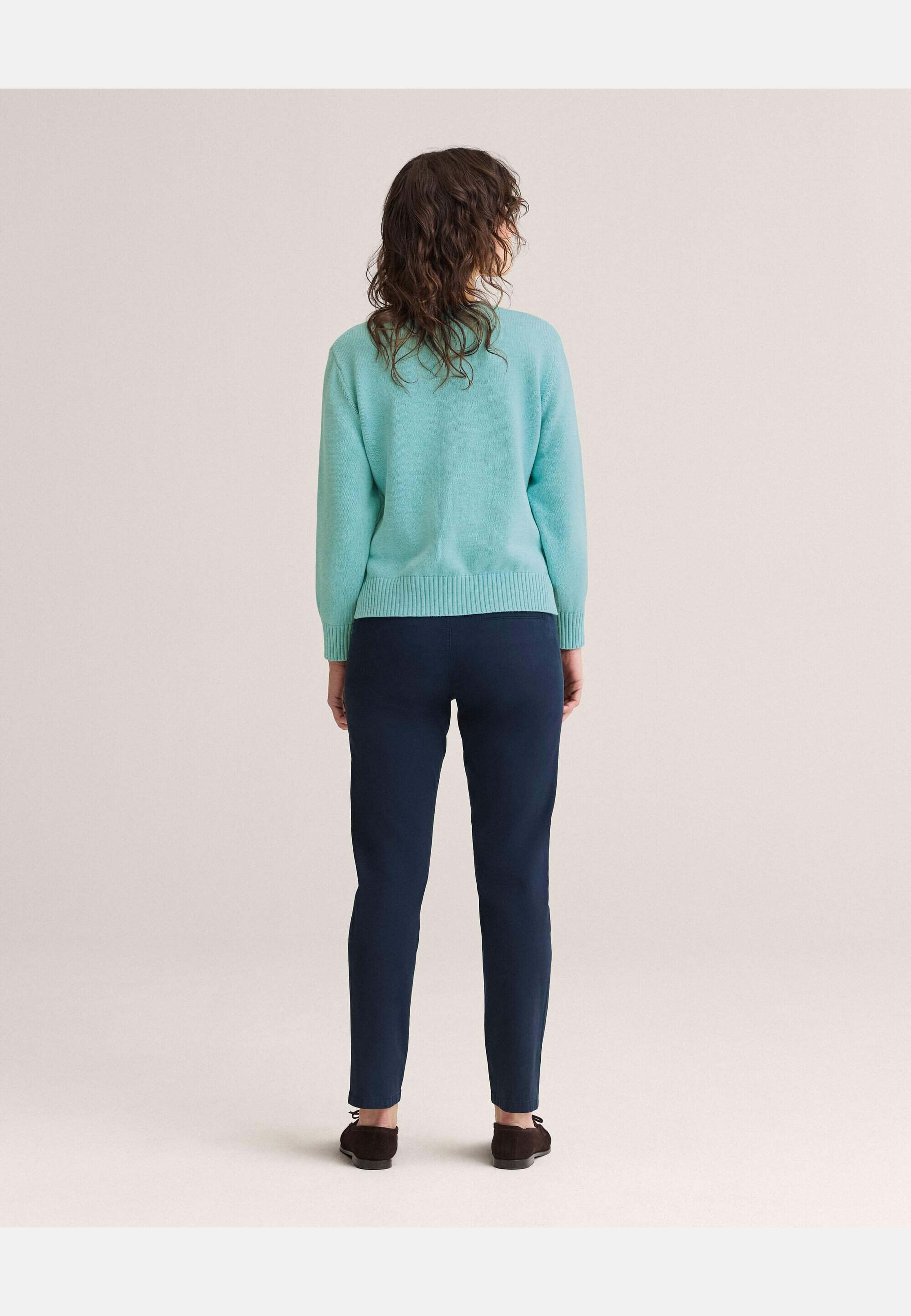 Roe Sweater, från Newhouse, i färgen turkos. Klicka för att öppna bilden i stort format