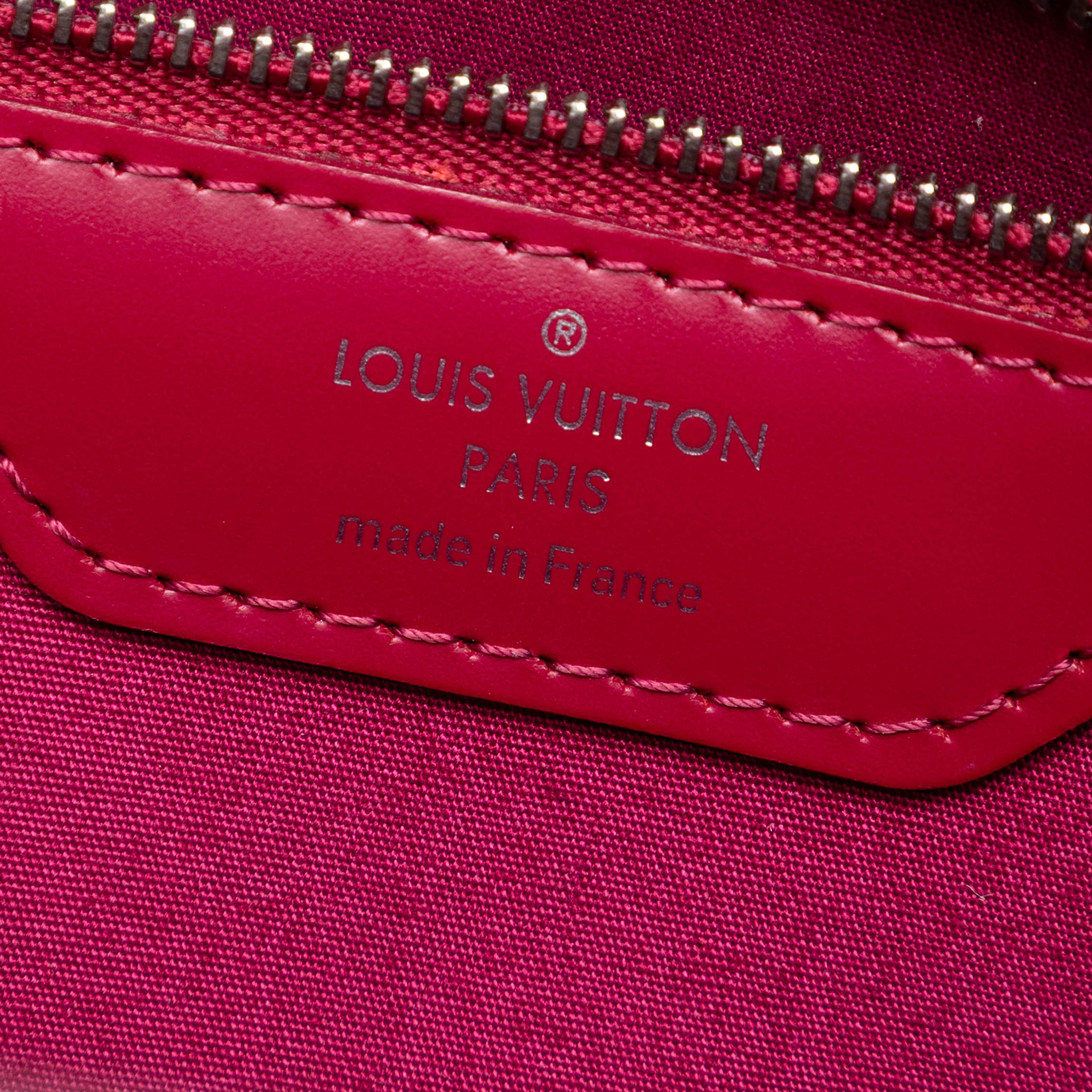 Louis Vuitton Epi Brea Mm, från Luxclusif, i färgen dark pink. Klicka för att öppna bilden i stort format