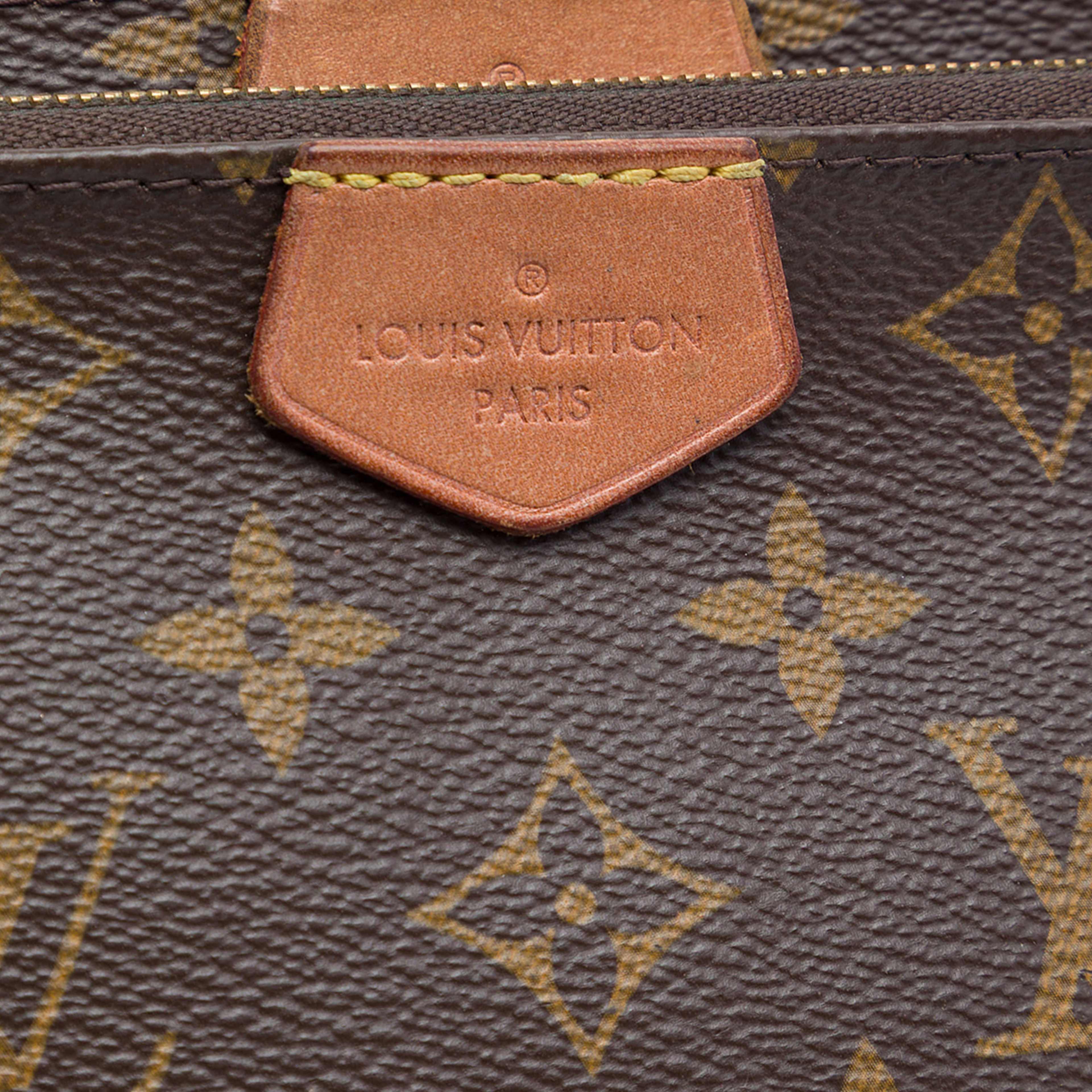 Louis Vuitton Monogram Multi Pochette Accessoires, från Luxclusif, i färgen brun. Klicka för att öppna bilden i stort format
