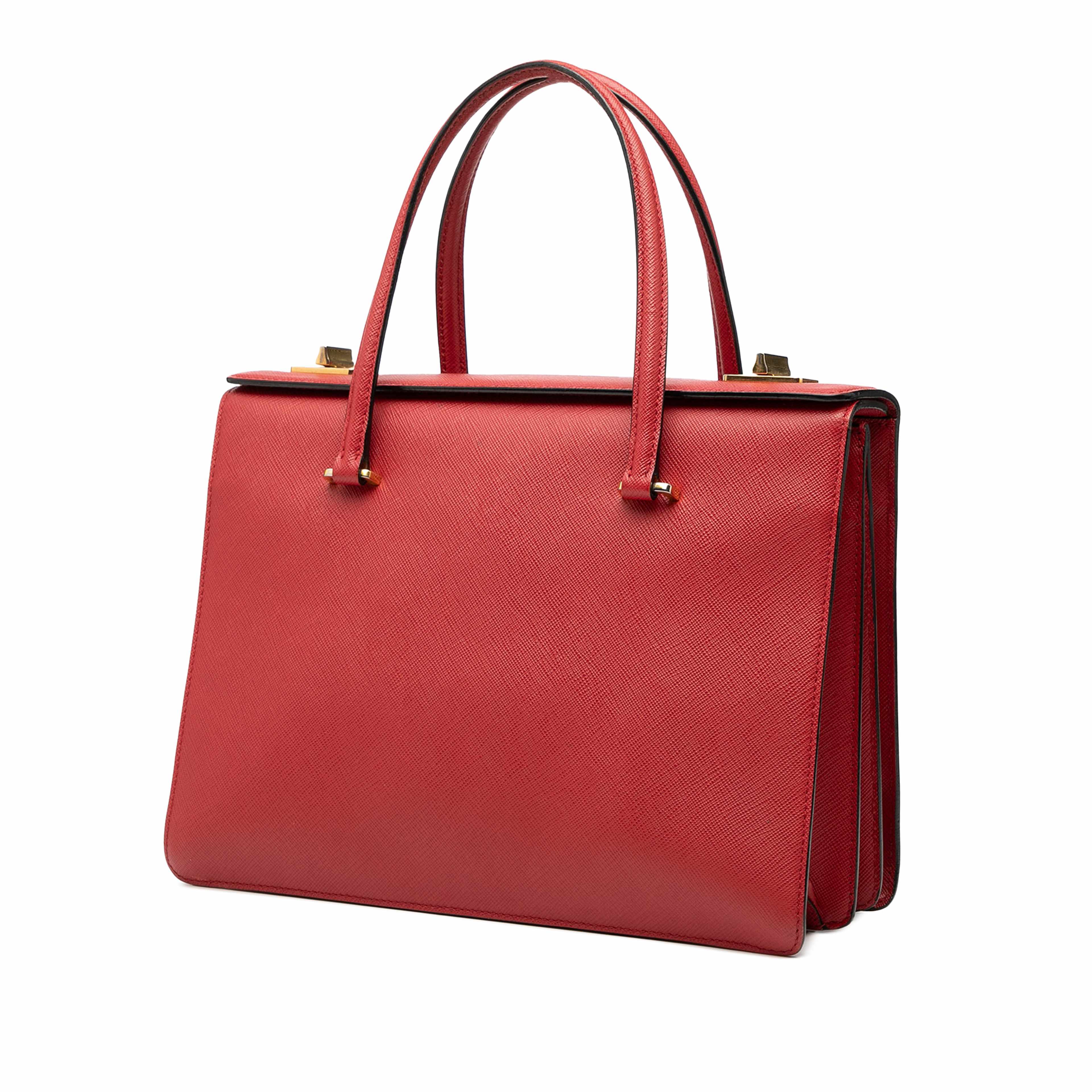 Prada Saffiano Turnlock Handbag, från Luxclusif, i färgen red. Klicka för att öppna bilden i stort format