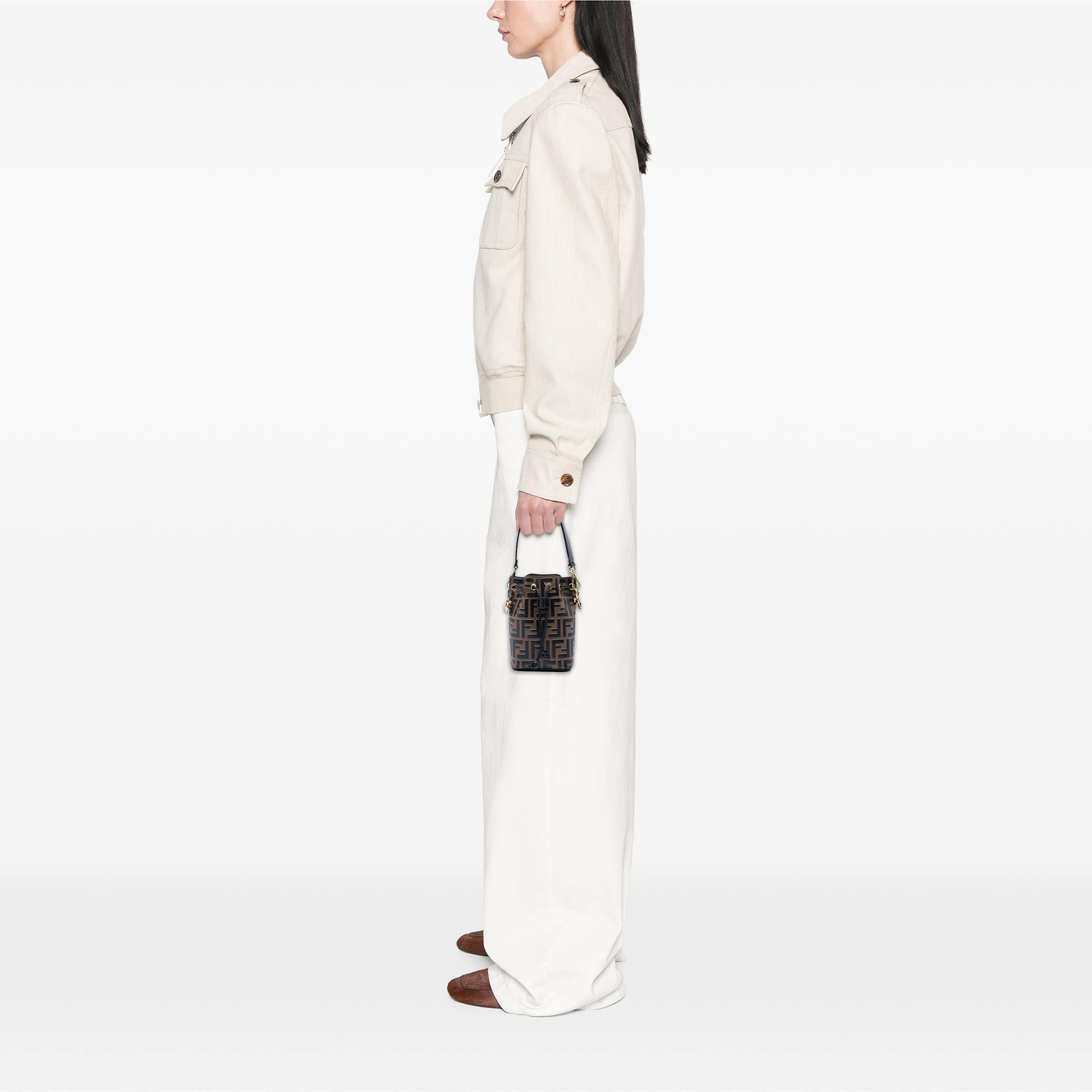 Fendi Mini Ff 1974 Embossed Leather Mon Tresor Bucket Bag, från Luxclusif, i färgen brun. Klicka för att öppna bilden i stort format