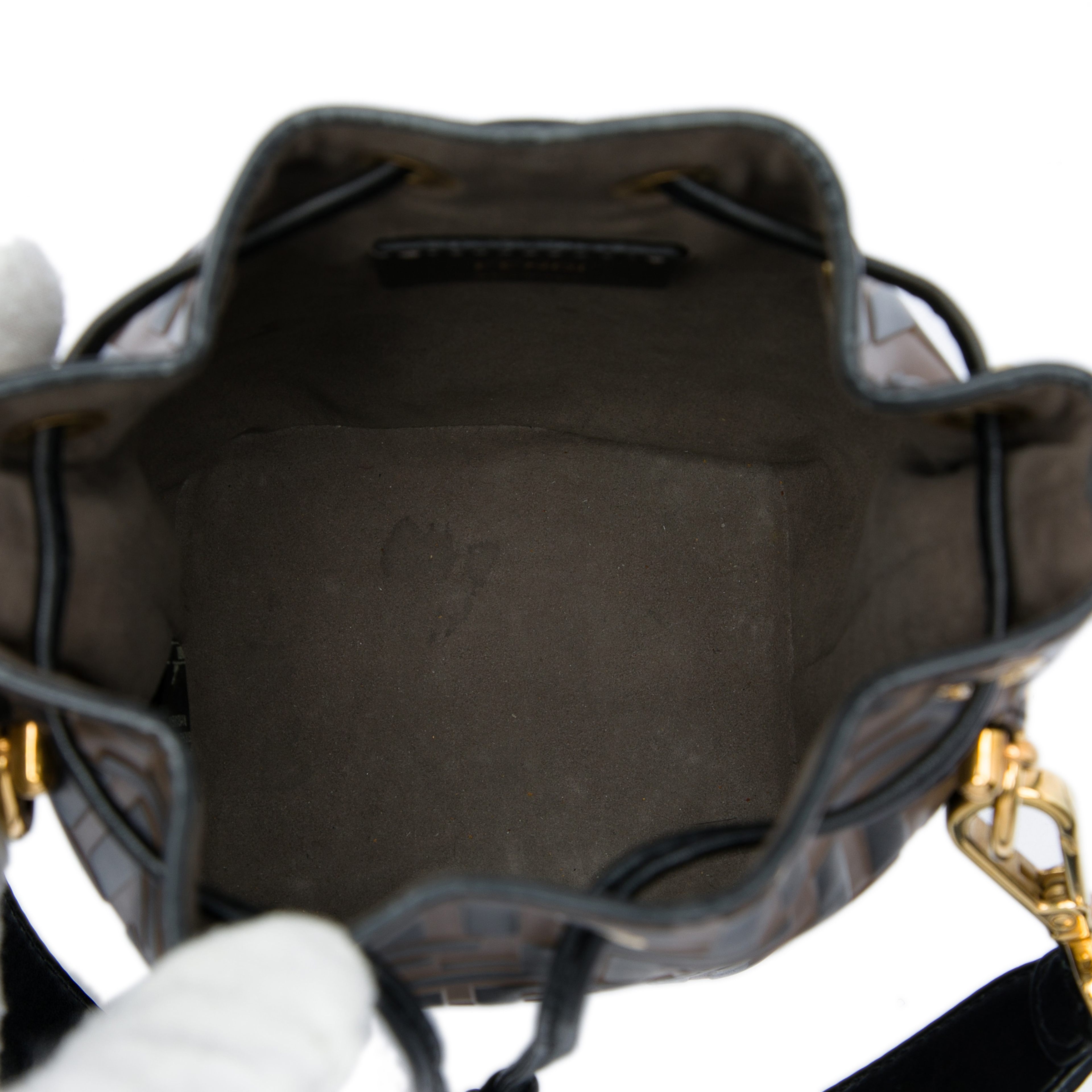 Fendi Mini Ff 1974 Embossed Leather Mon Tresor Bucket Bag, från Luxclusif, i färgen brun. Klicka för att öppna bilden i stort format