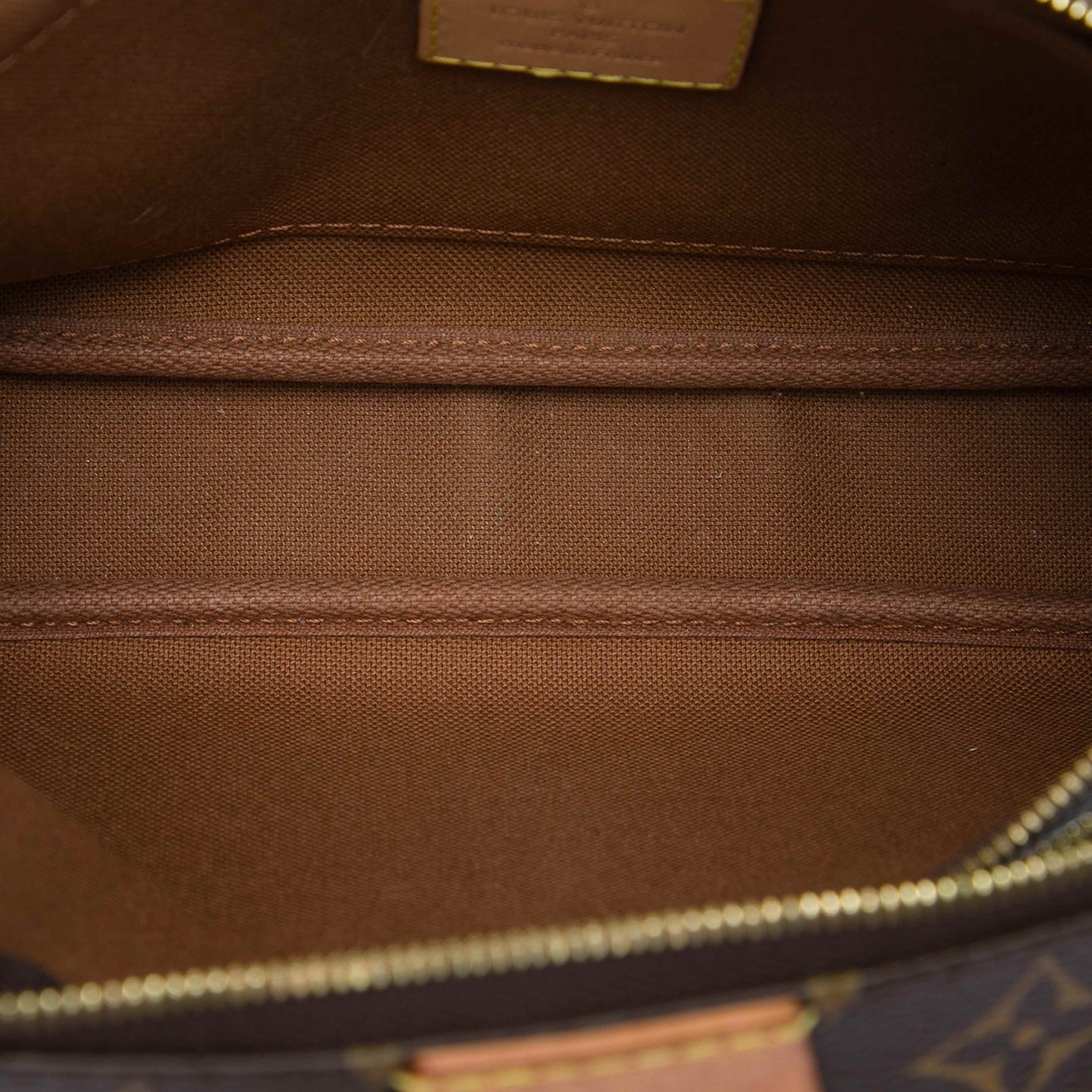 Louis Vuitton Monogram Multi Pochette Accessoires, från Luxclusif, i färgen brun. Klicka för att öppna bilden i stort format
