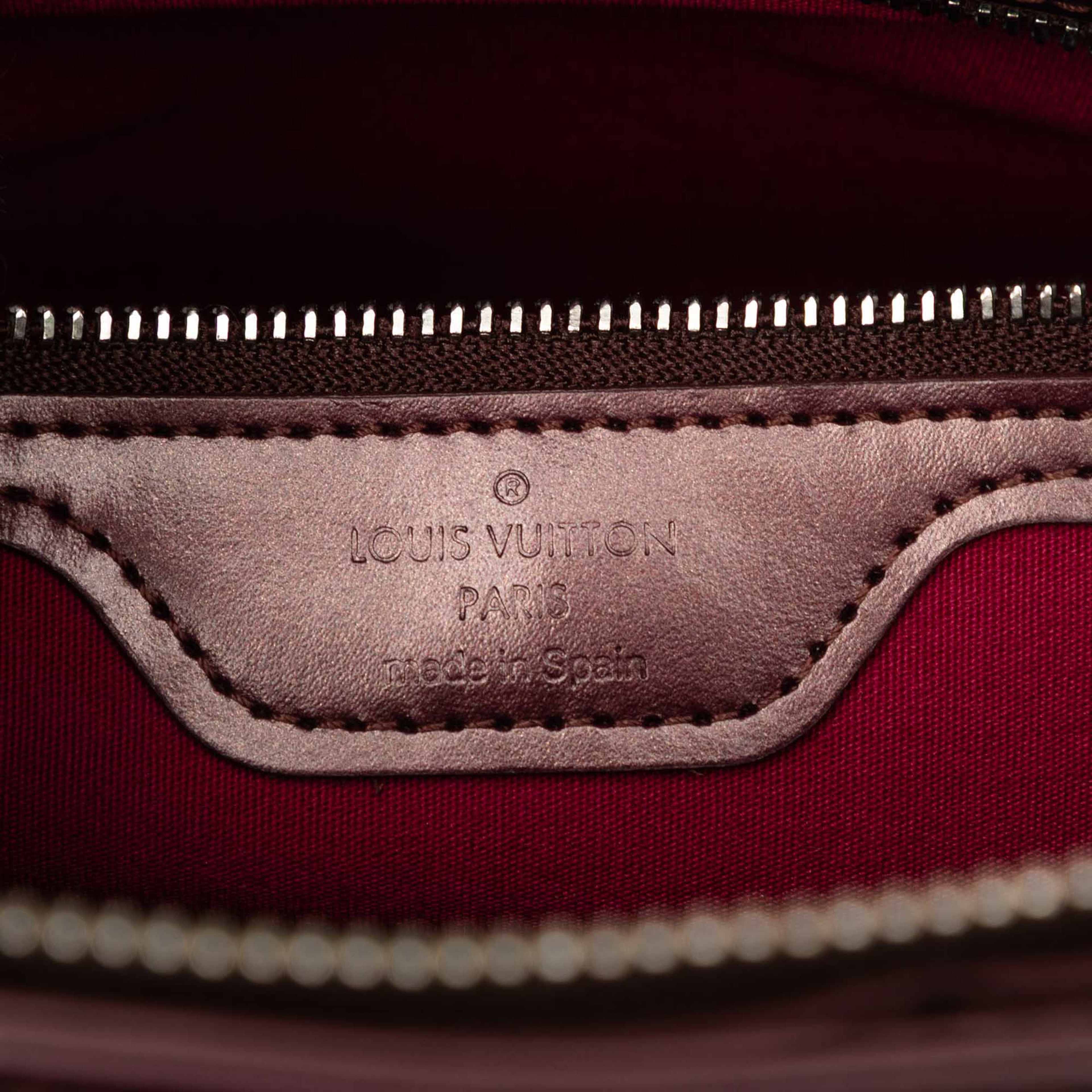 Louis Vuitton Monogram Mat Stockton, från Luxclusif, i färgen röd. Klicka för att öppna bilden i stort format