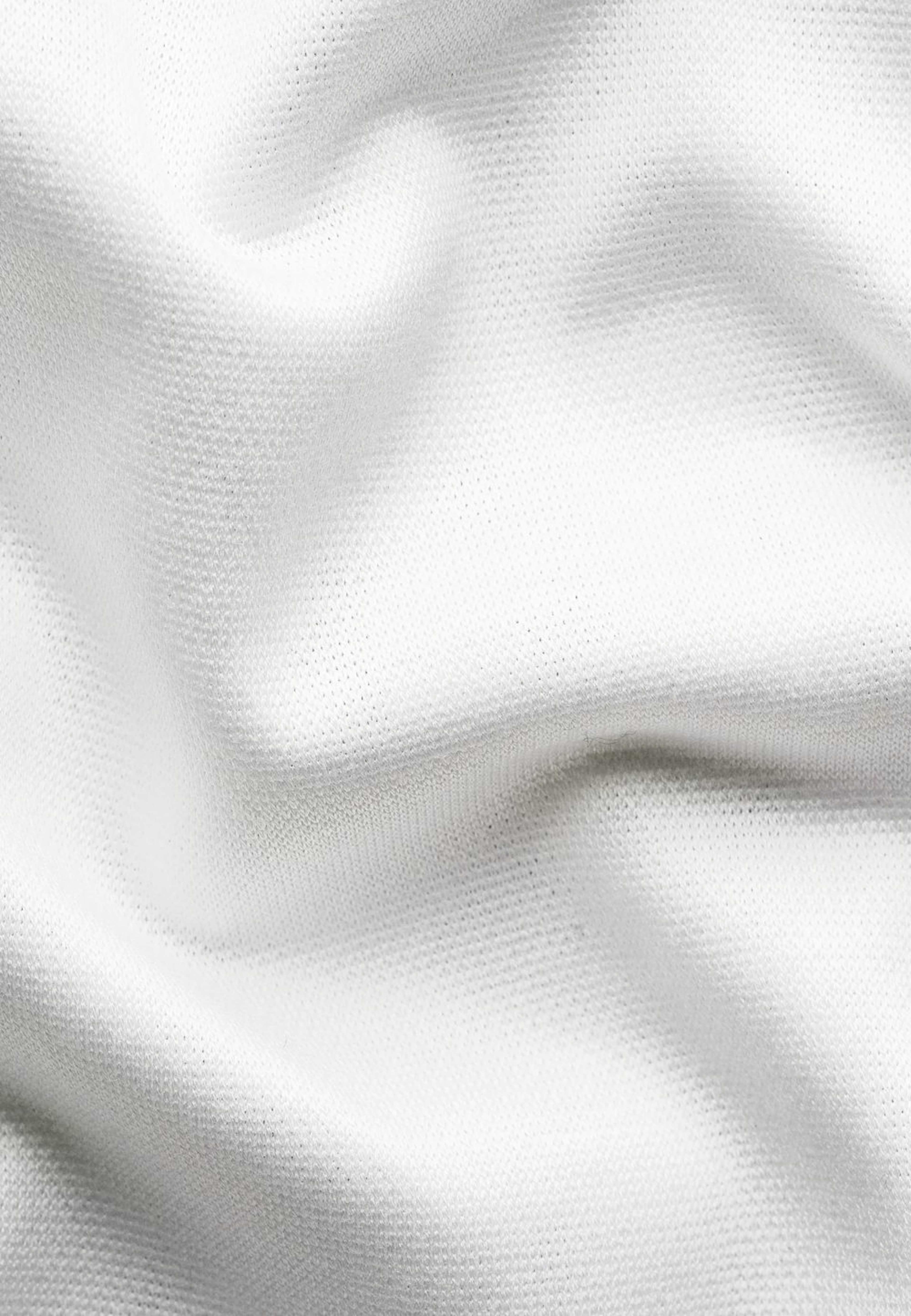 Jacquardvävd Piké, från Eton, i färgen white. Klicka för att öppna bilden i stort format