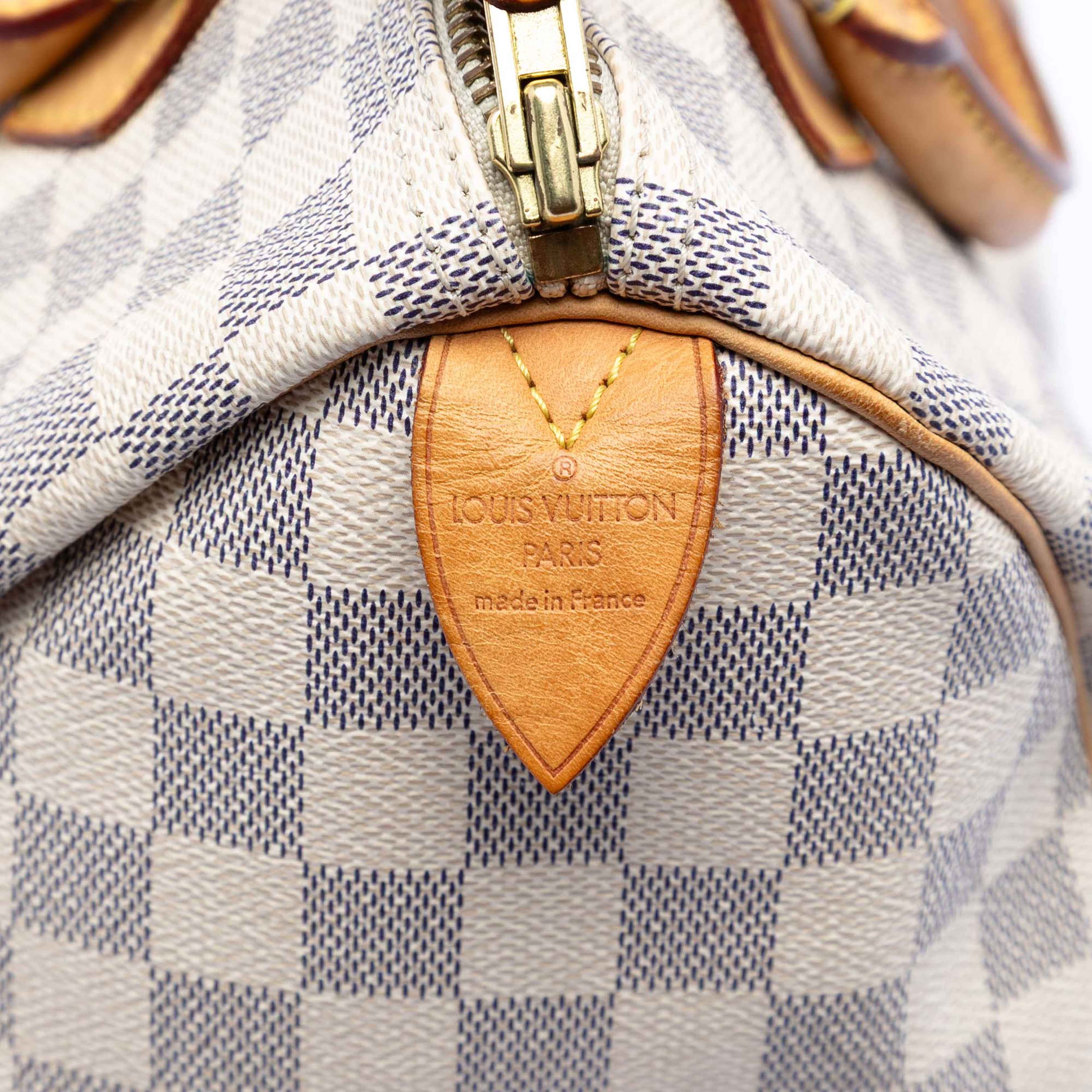 Louis Vuitton Damier Azur Speedy 30, från Luxclusif, i färgen white. Klicka för att öppna bilden i stort format