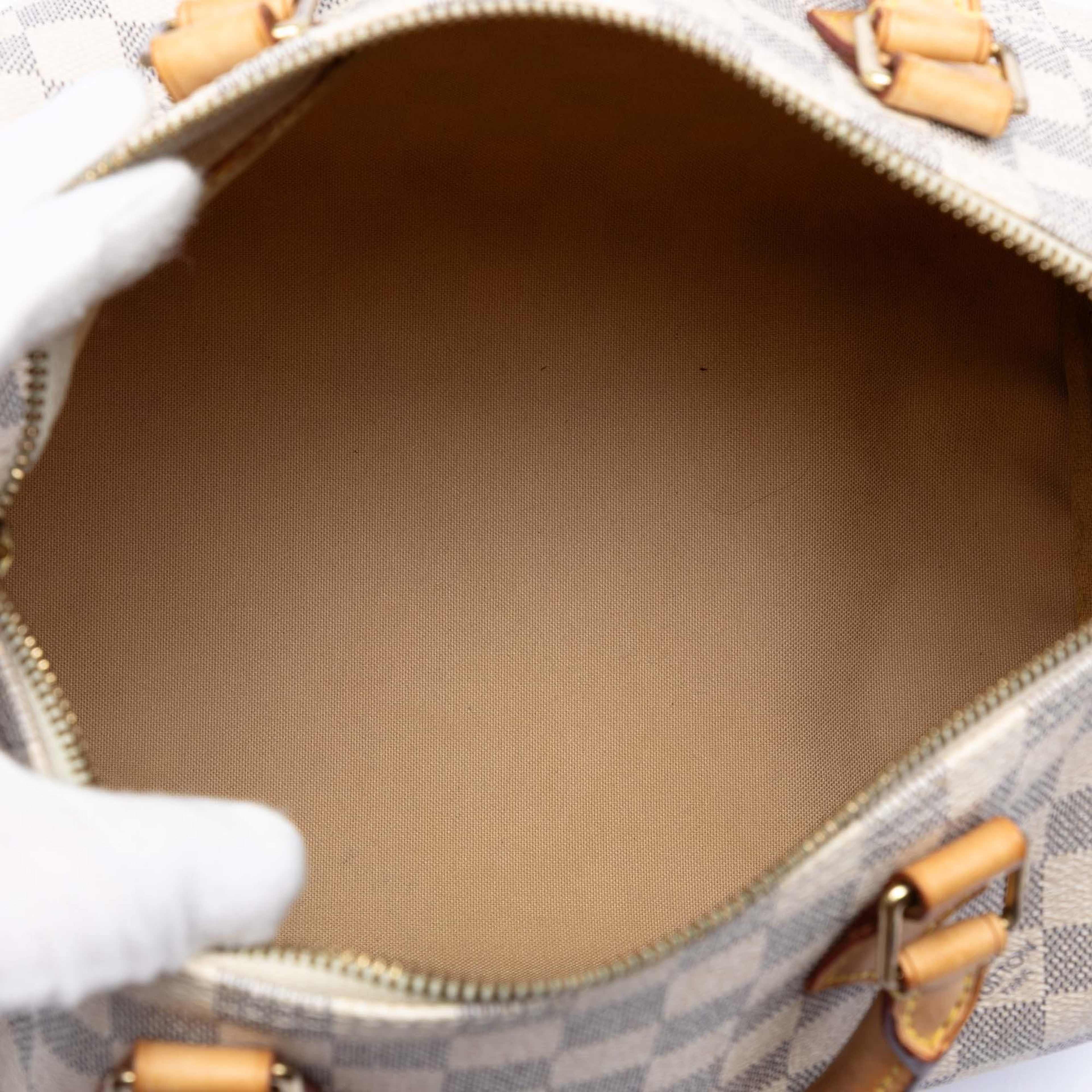 Louis Vuitton Damier Azur Speedy 30, från Luxclusif, i färgen white. Klicka för att öppna bilden i stort format