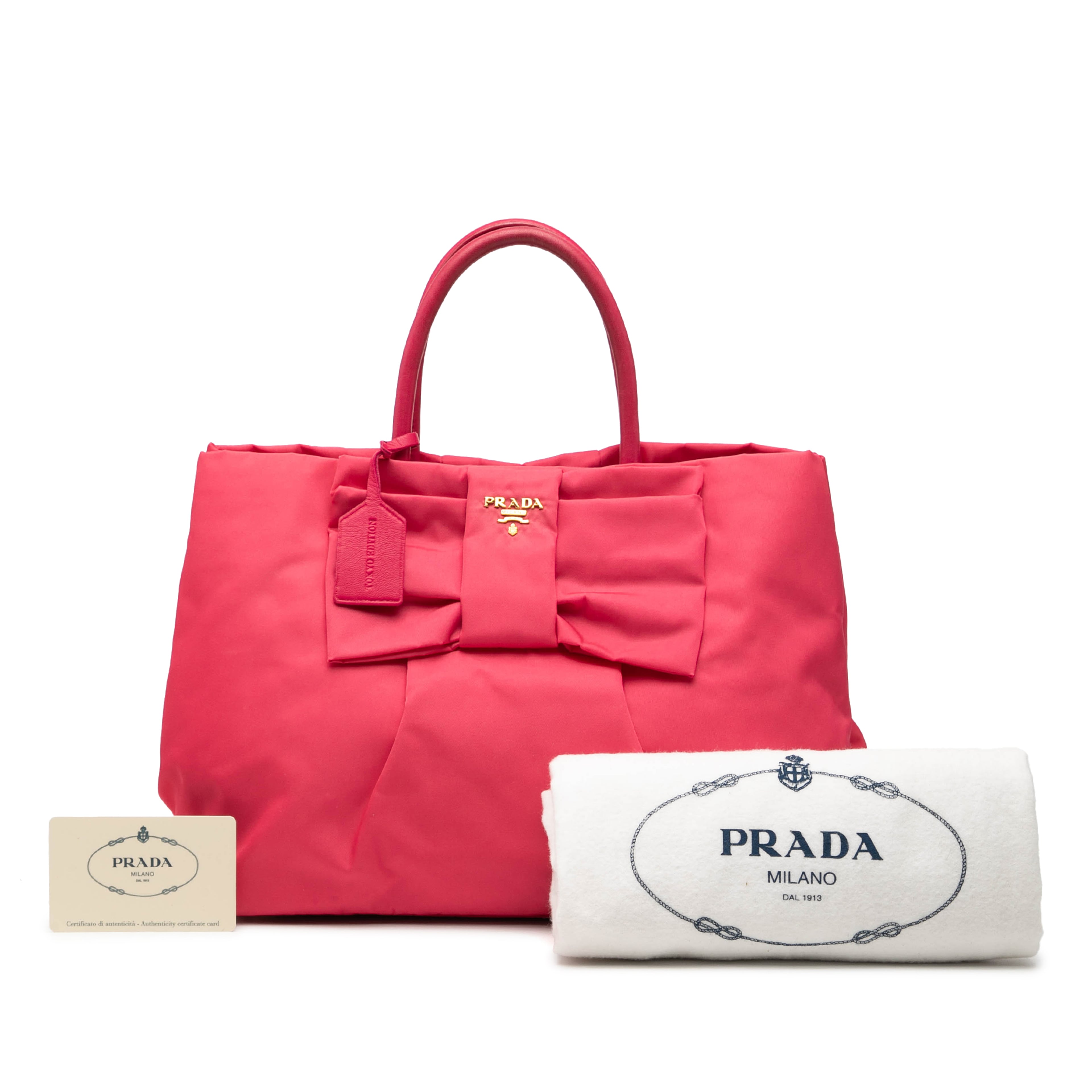 Prada Tessuto Fiocco Bow Tote, från Luxclusif, i färgen rosa. Klicka för att öppna bilden i stort format