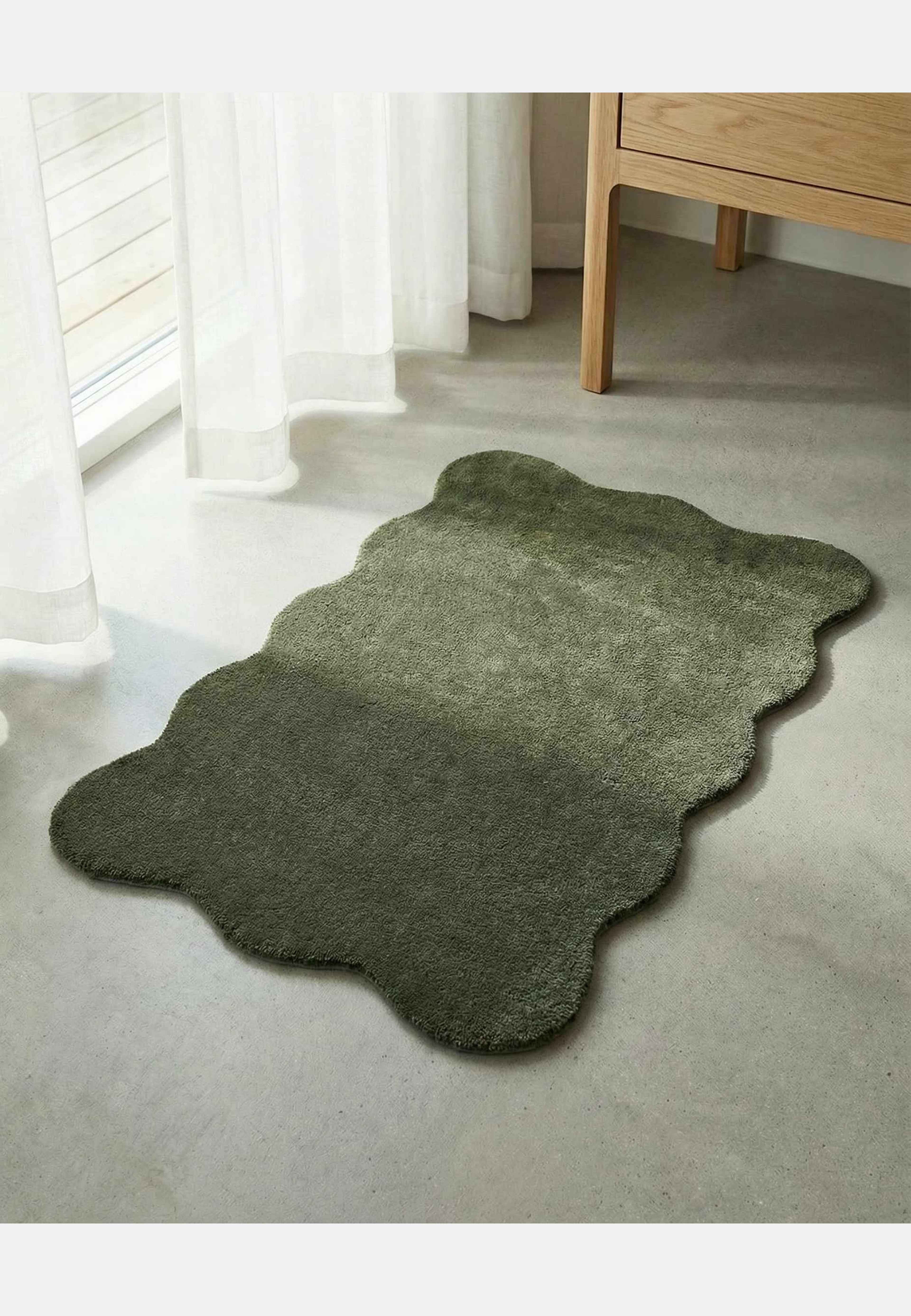 Dörrmatta Clam, från Classic Collection, i färgen skogsgrön. Klicka för att öppna bilden i stort format