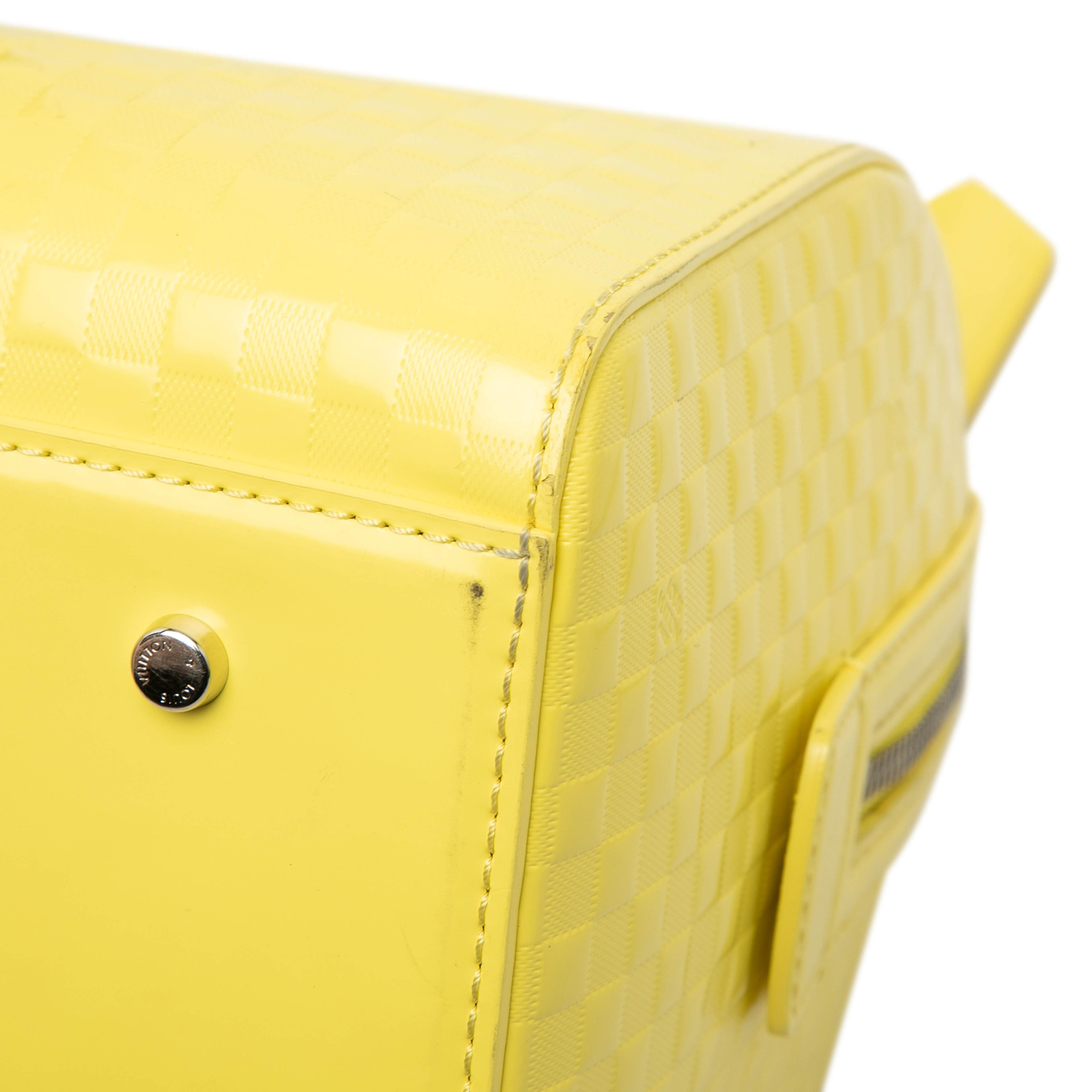 Louis Vuitton Damier Facette Speedy Cube Pm, från Luxclusif, i färgen gul. Klicka för att öppna bilden i stort format