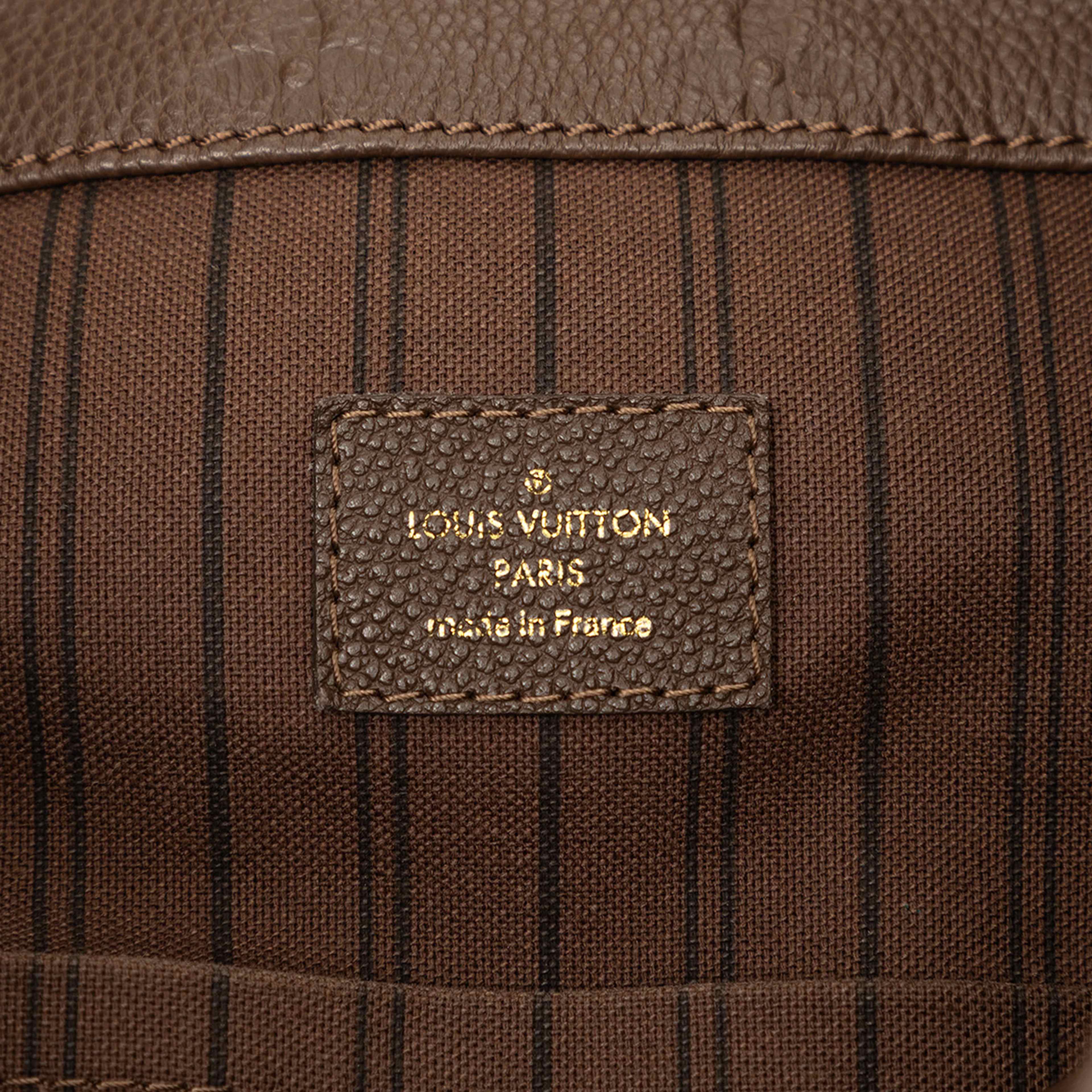 Louis Vuitton Monogram Empreinte Artsy Mm, från Luxclusif, i färgen brown. Klicka för att öppna bilden i stort format