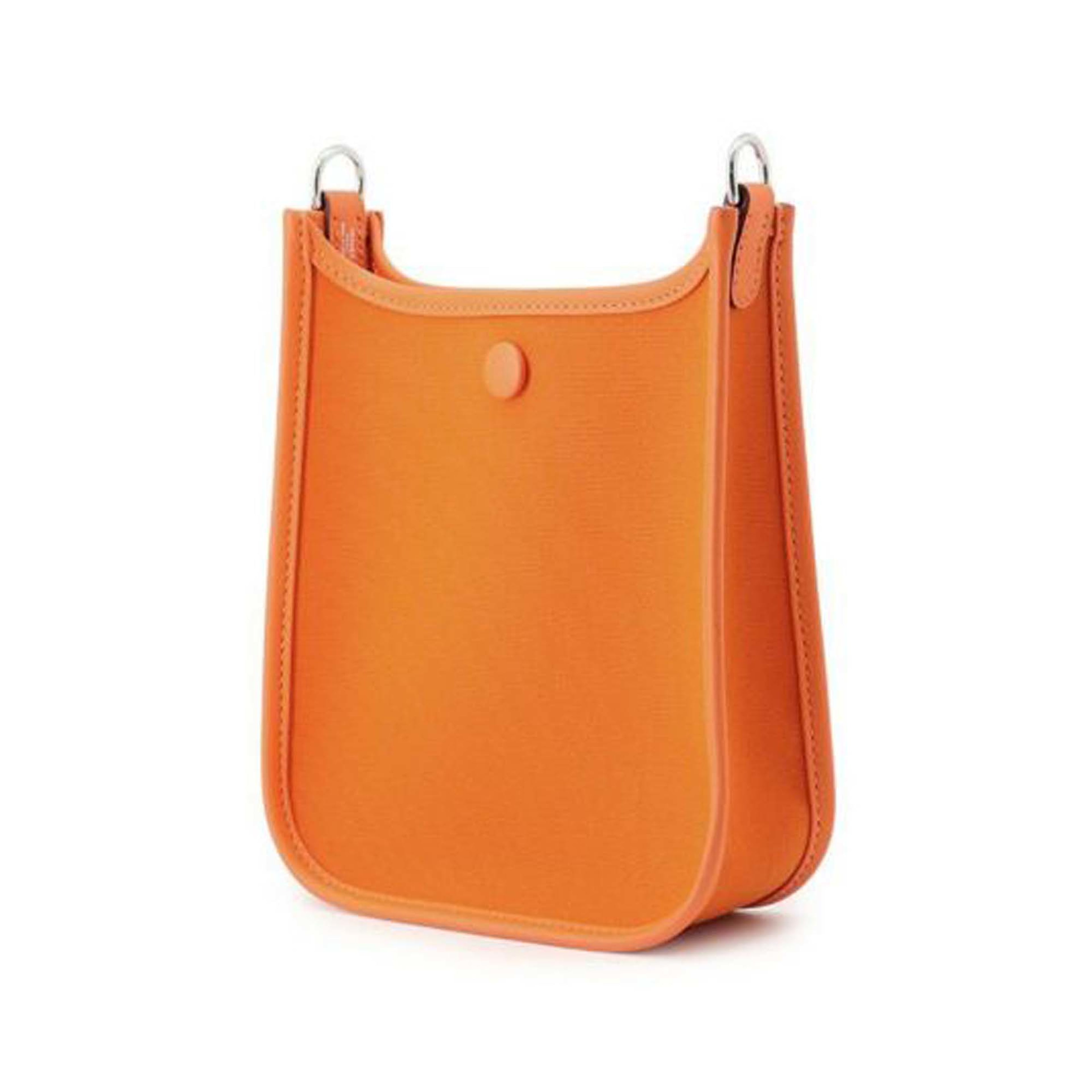 Hermès Toile Officier And Swift Neo Evelyne 16, från Luxclusif, i färgen orange. Klicka för att öppna bilden i stort format