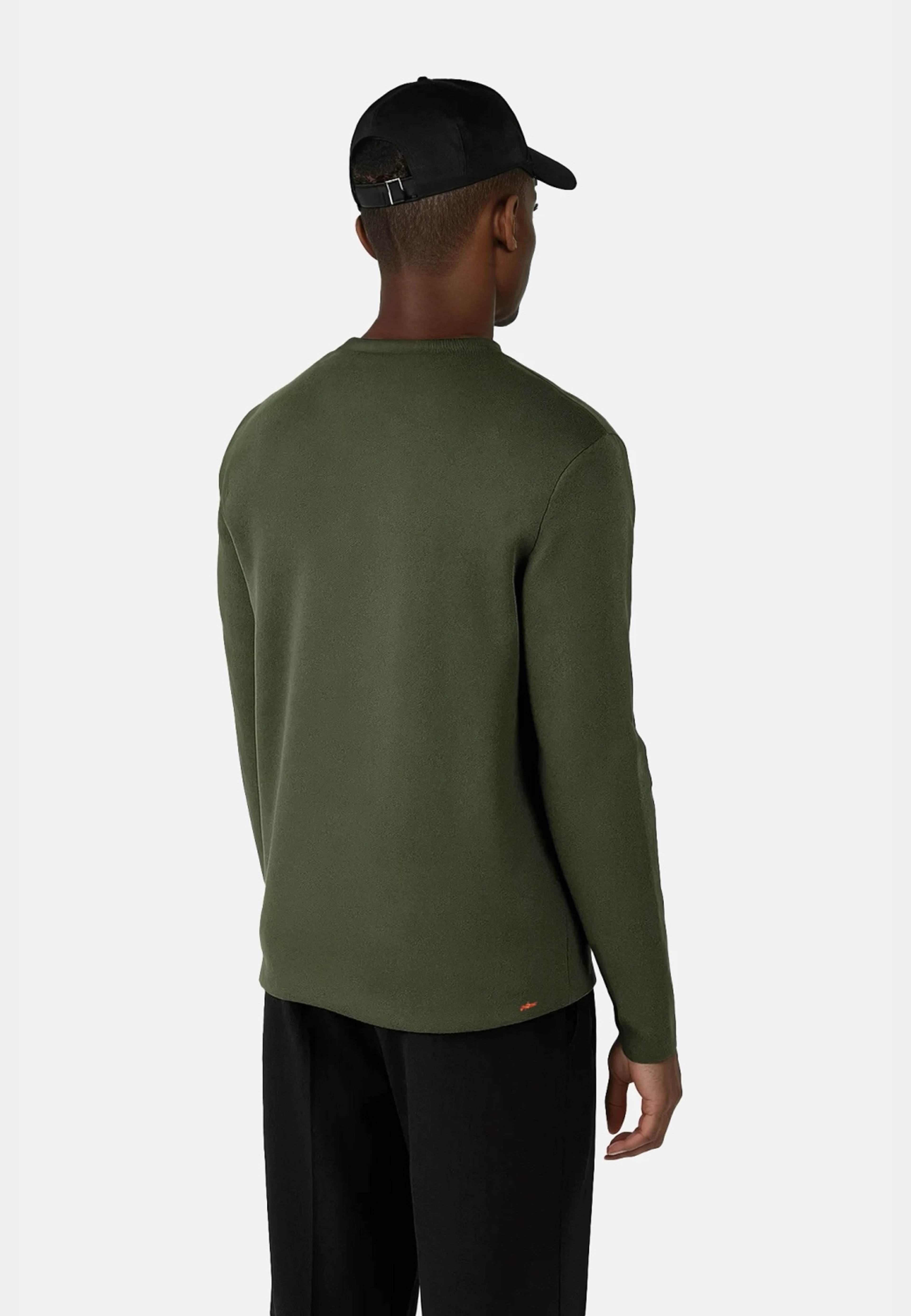 Clark Knitted Roundneck, från Ciszere, i färgen green. Klicka för att öppna bilden i stort format