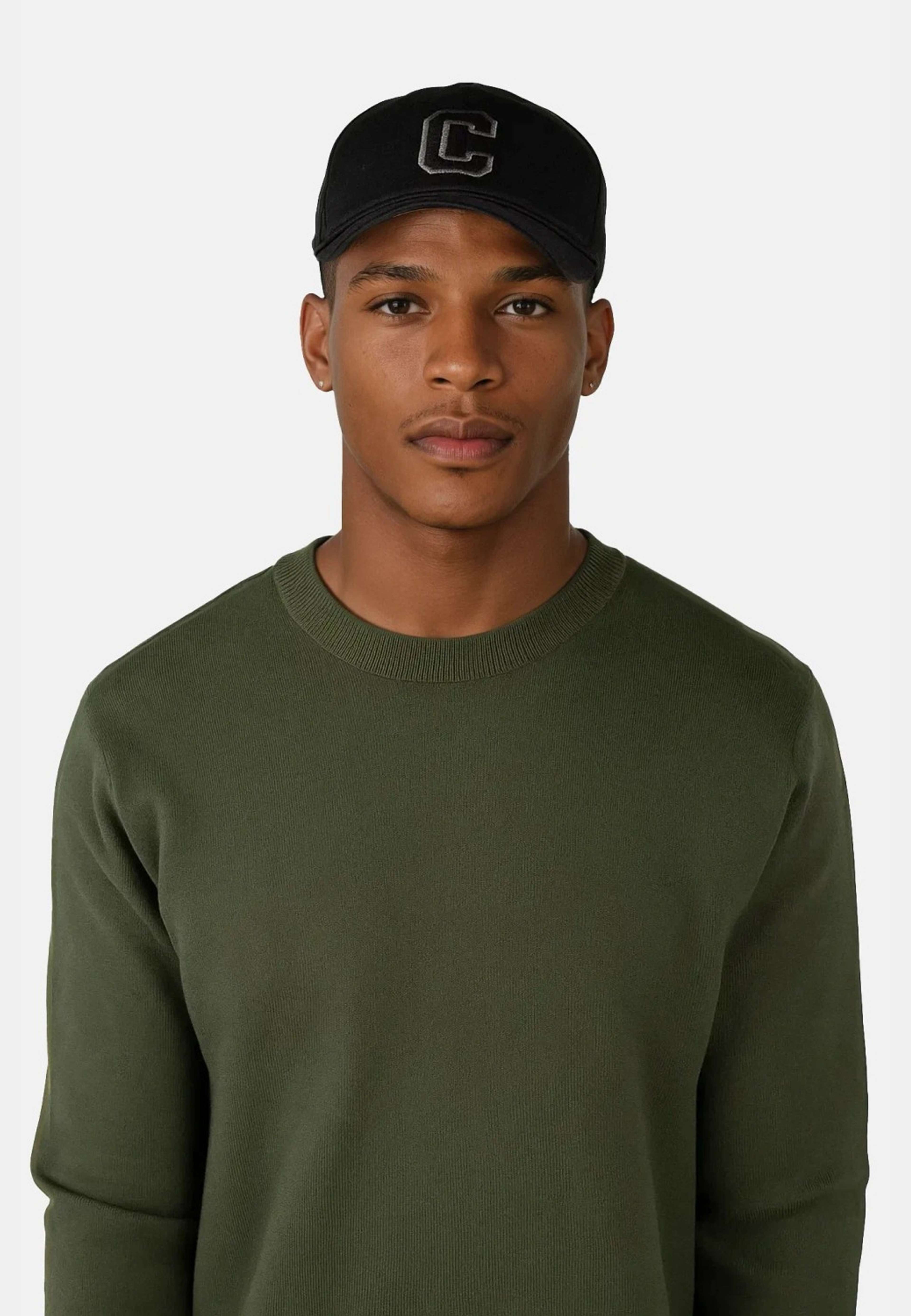 Clark Knitted Roundneck, från Ciszere, i färgen green. Klicka för att öppna bilden i stort format