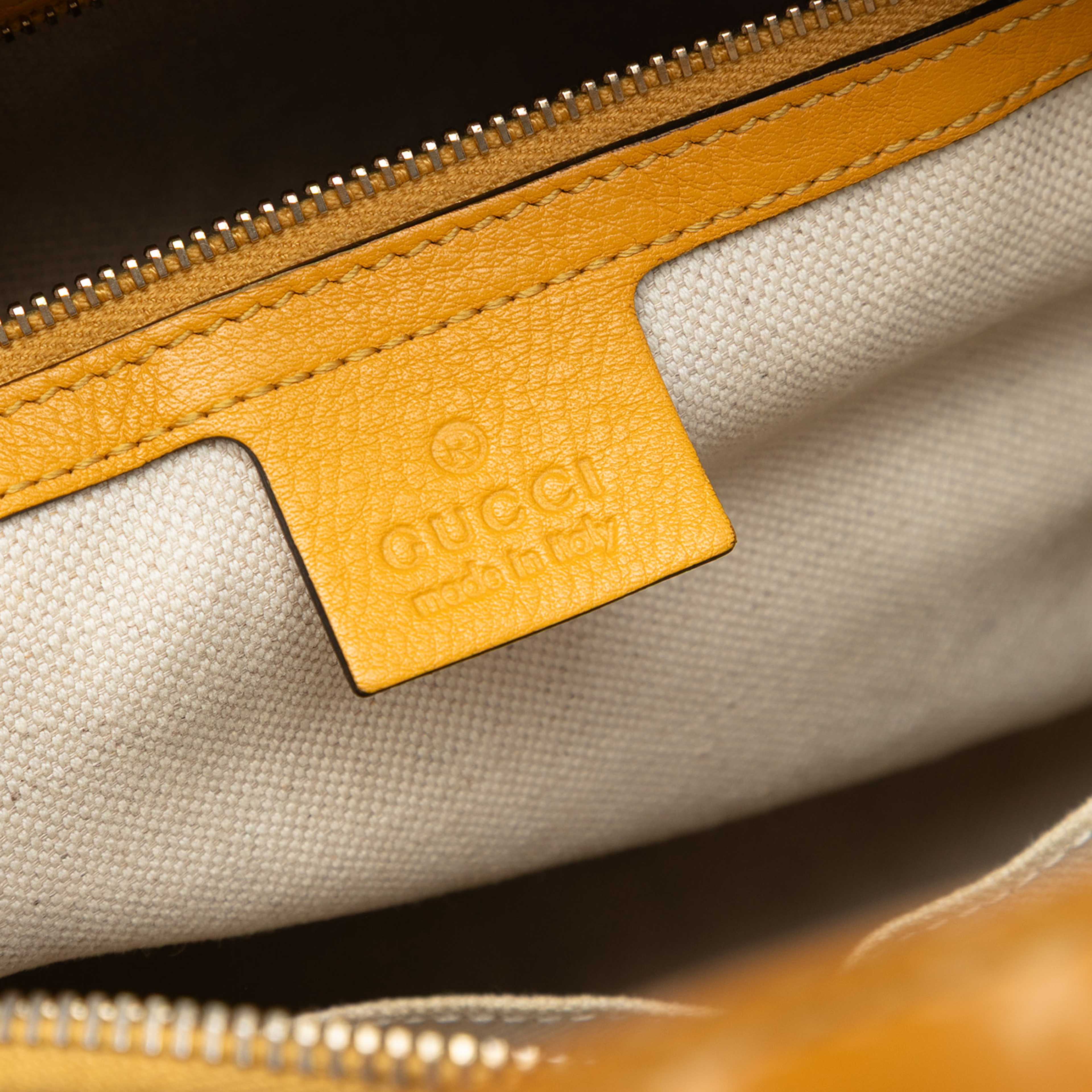 Gucci Medium Microguccissima Patent Nice Dome Satchel, från Luxclusif, i färgen yellow. Klicka för att öppna bilden i stort format