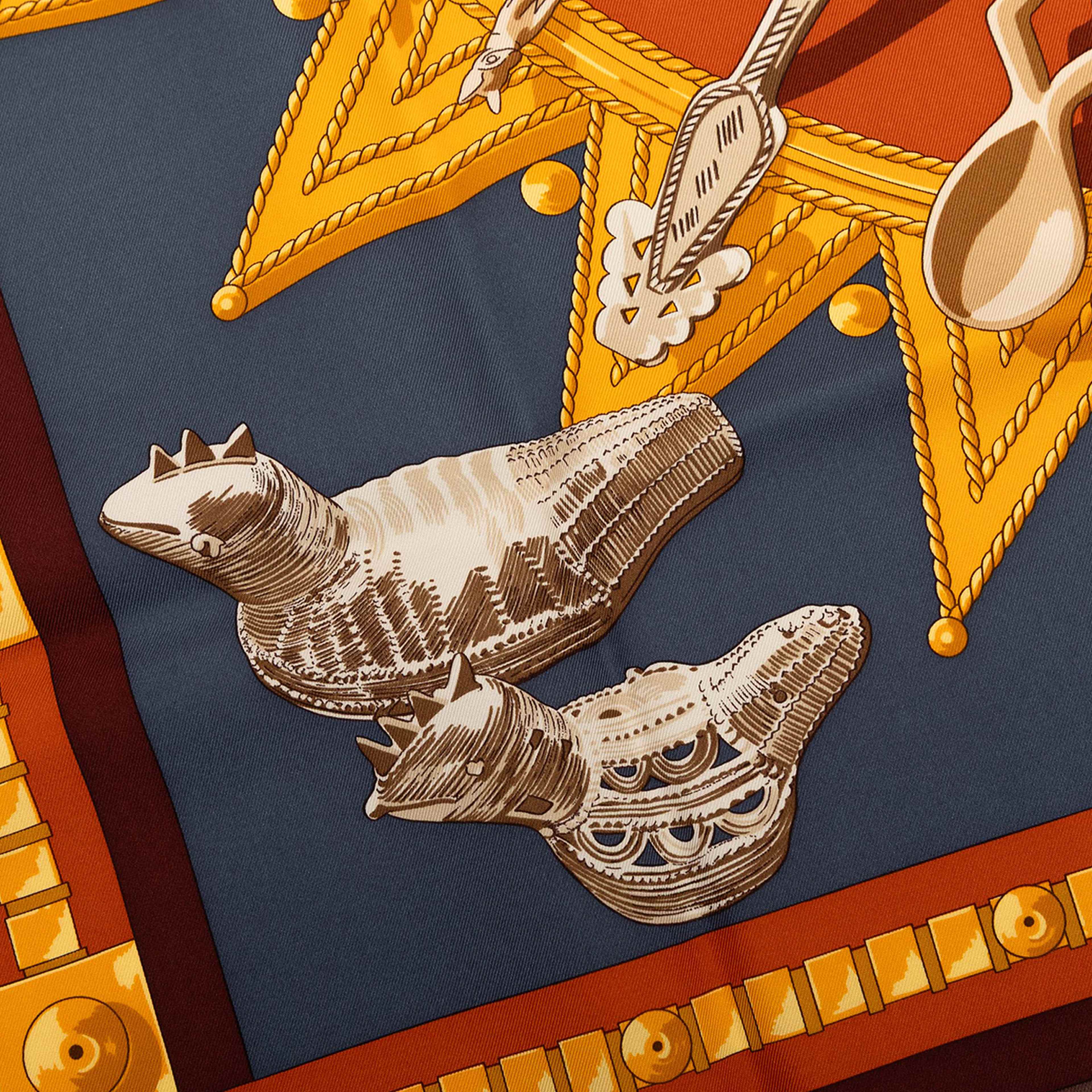 Hermès Cuillers D Afrique Silk Scarf 90, från Luxclusif, i färgen orange. Klicka för att öppna bilden i stort format
