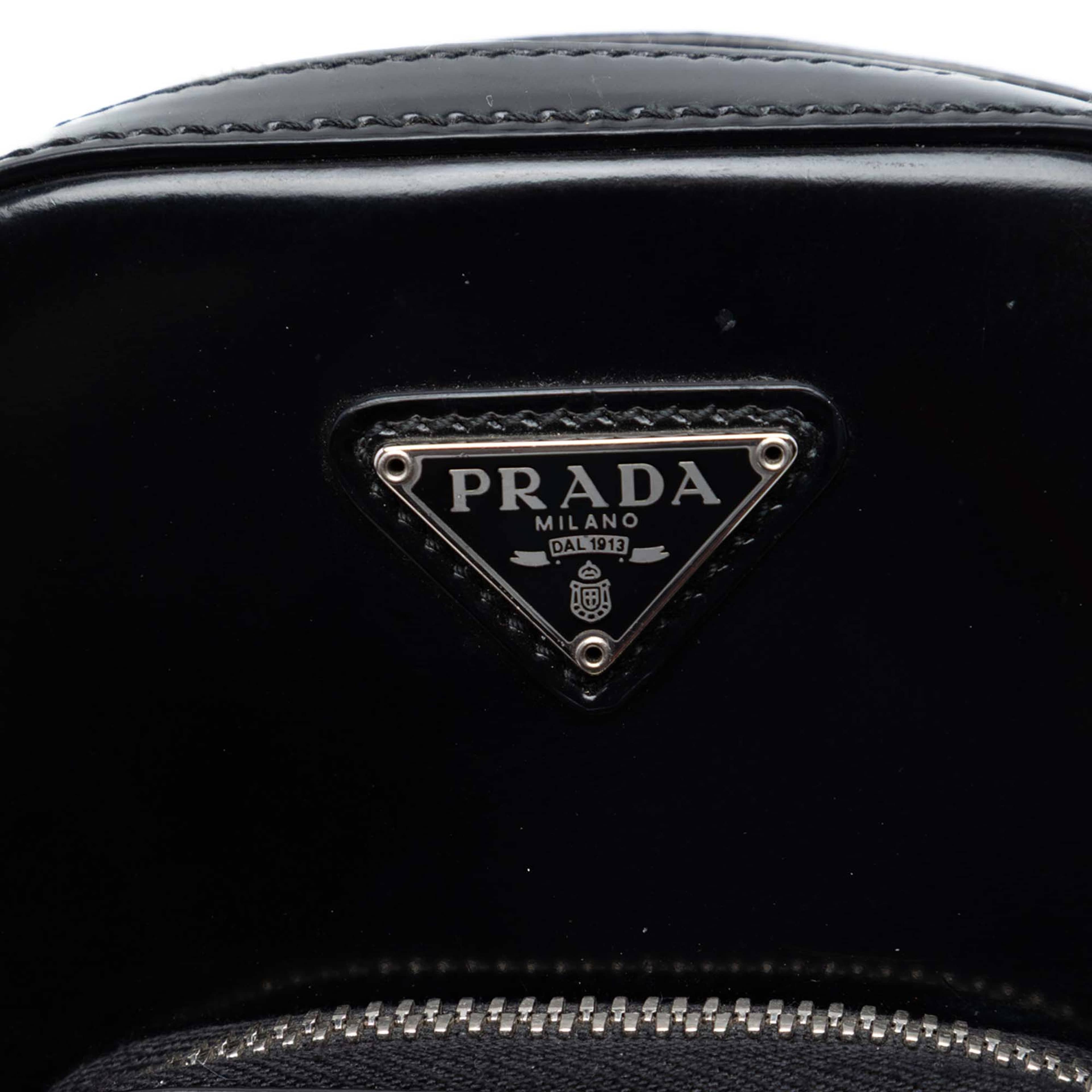 Prada Mini Brushed Leather Phone Pouch, från Luxclusif, i färgen black. Klicka för att öppna bilden i stort format