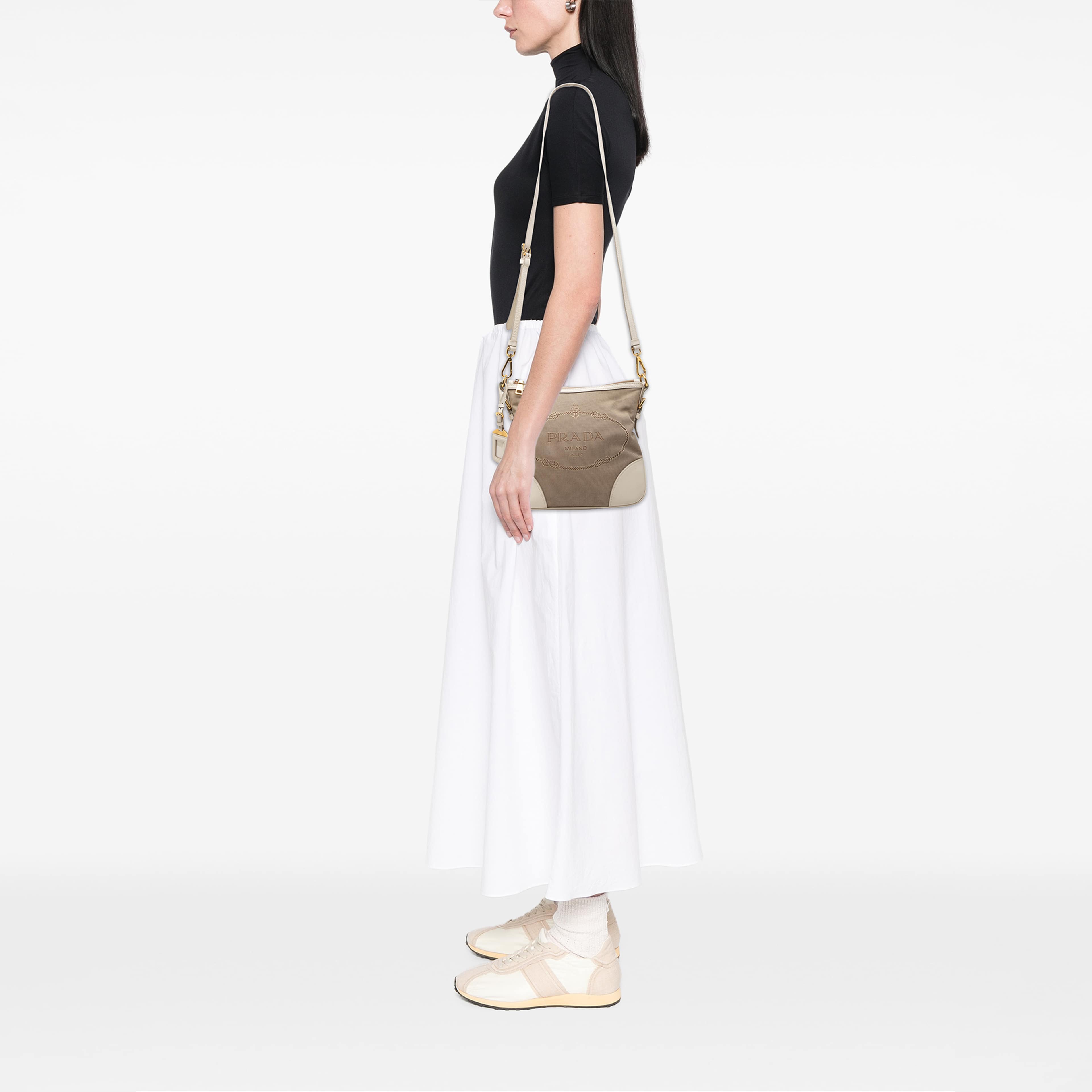 Prada Canvas Canapa Logo Crossbody, från Luxclusif, i färgen beige. Klicka för att öppna bilden i stort format