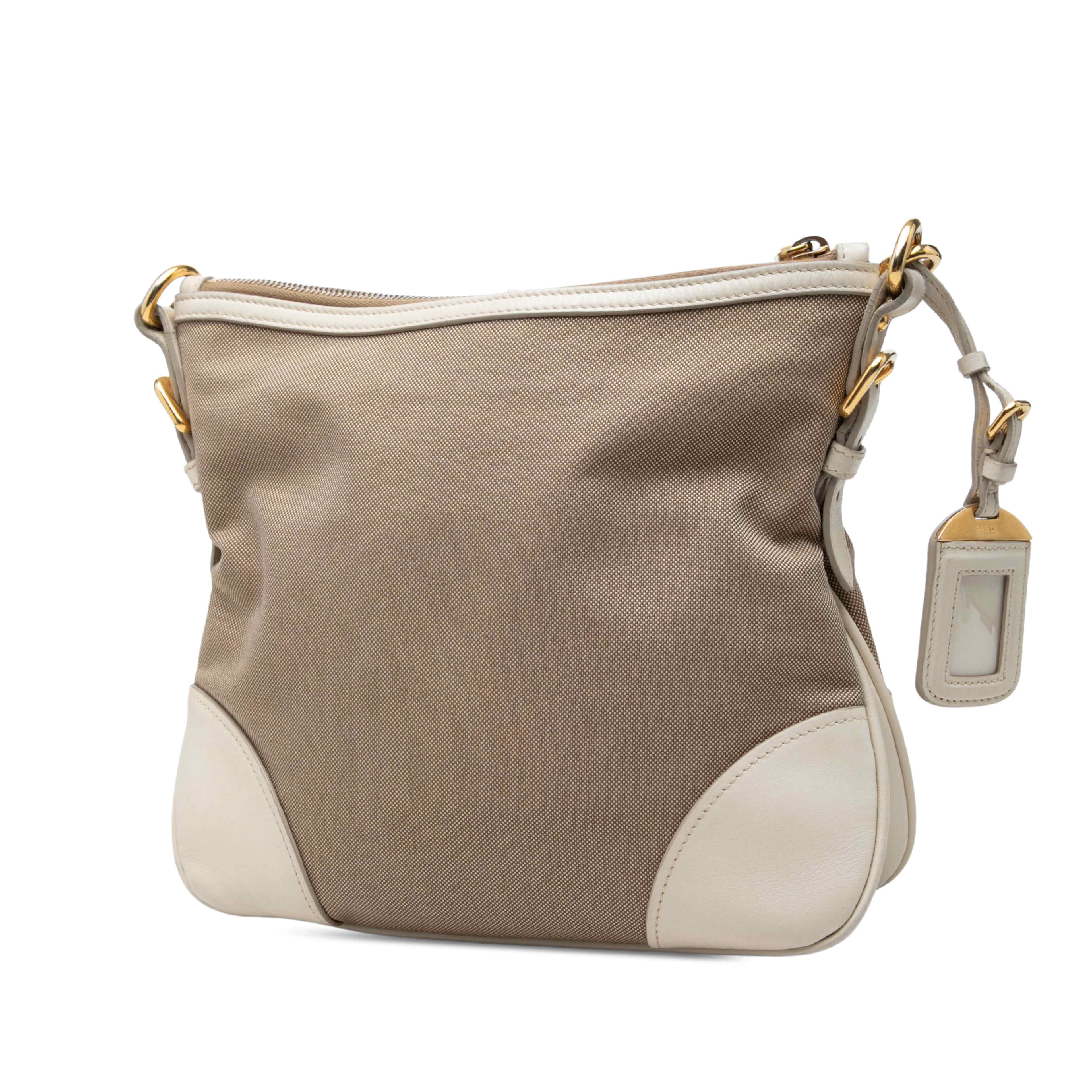 Prada Canvas Canapa Logo Crossbody, från Luxclusif, i färgen beige. Klicka för att öppna bilden i stort format