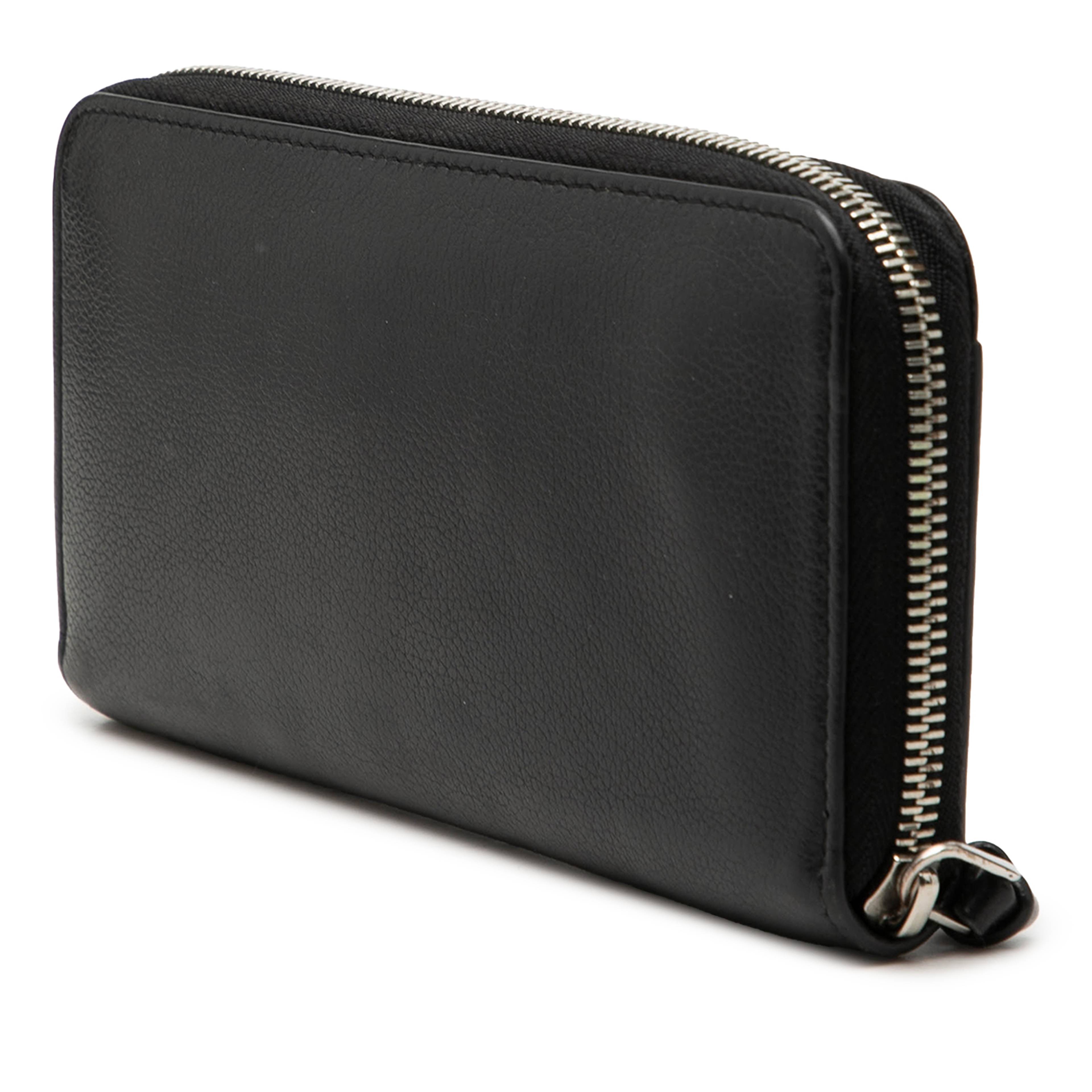 Louis Vuitton Leather Lockme Zippy Wallet, från Luxclusif, i färgen black. Klicka för att öppna bilden i stort format