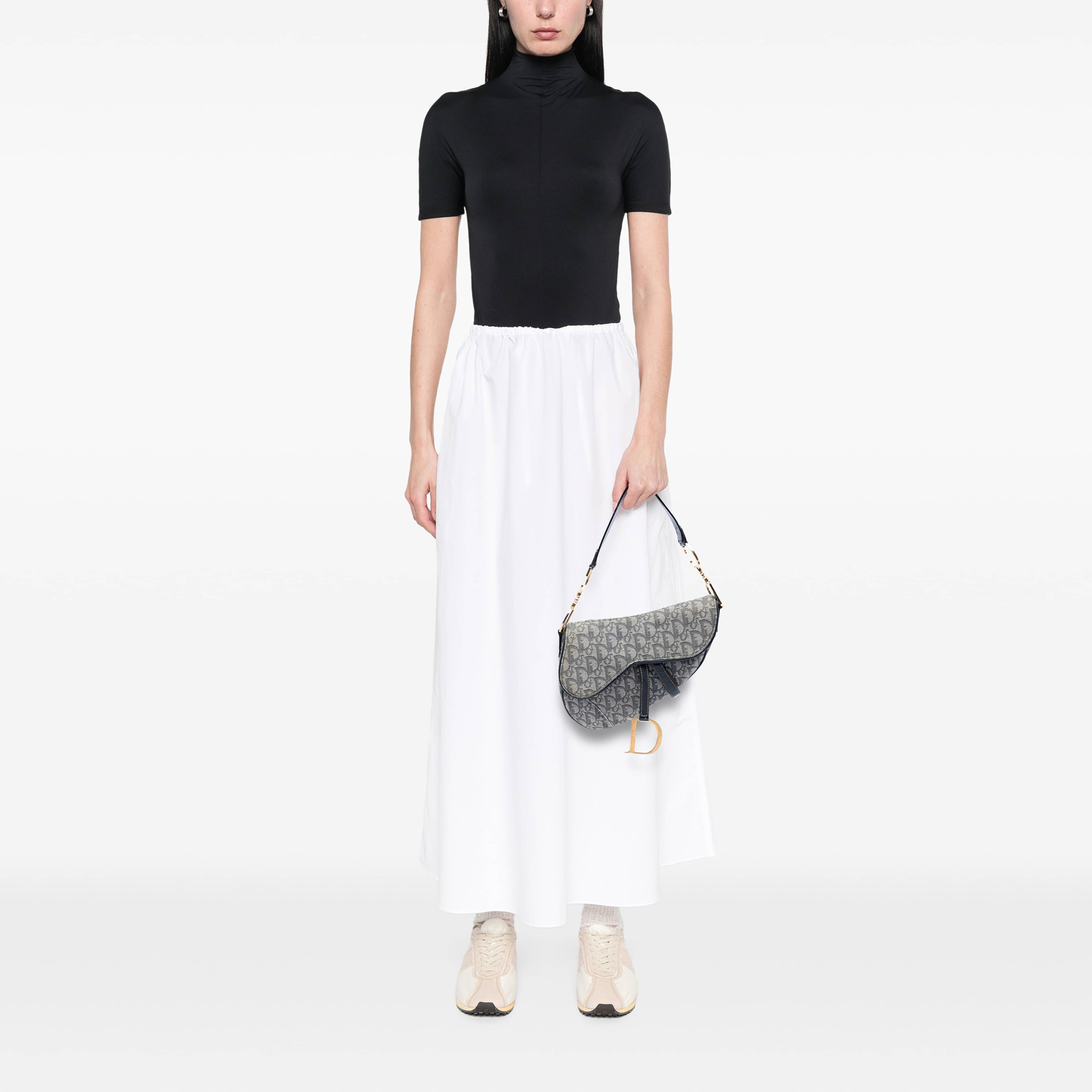 Dior Diorissimo Canvas Saddle Bag, från Luxclusif, i färgen navy. Klicka för att öppna bilden i stort format