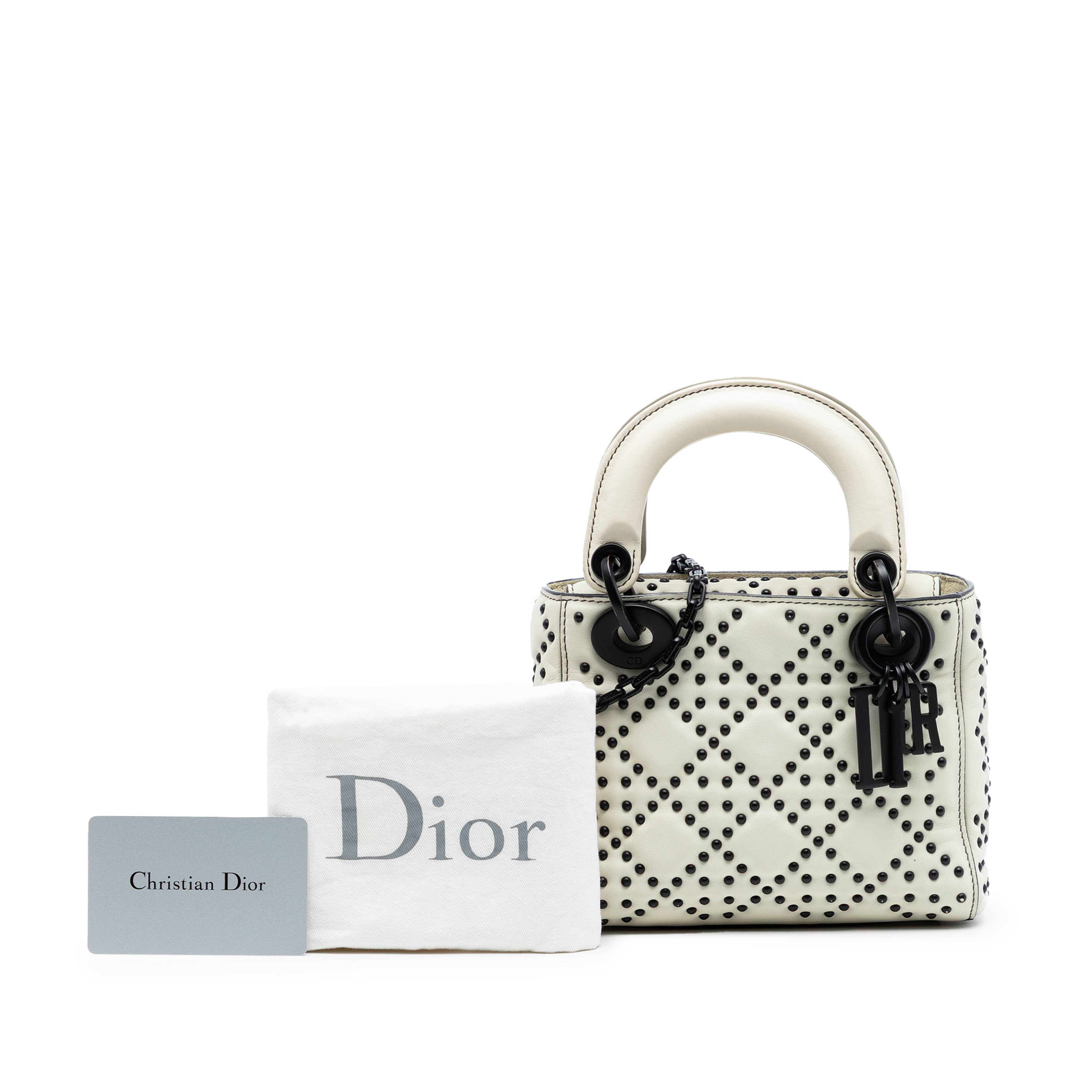 Dior Mini Lambskin Cannage Studded Supple Lady Dior, från Luxclusif, i färgen vit. Klicka för att öppna bilden i stort format