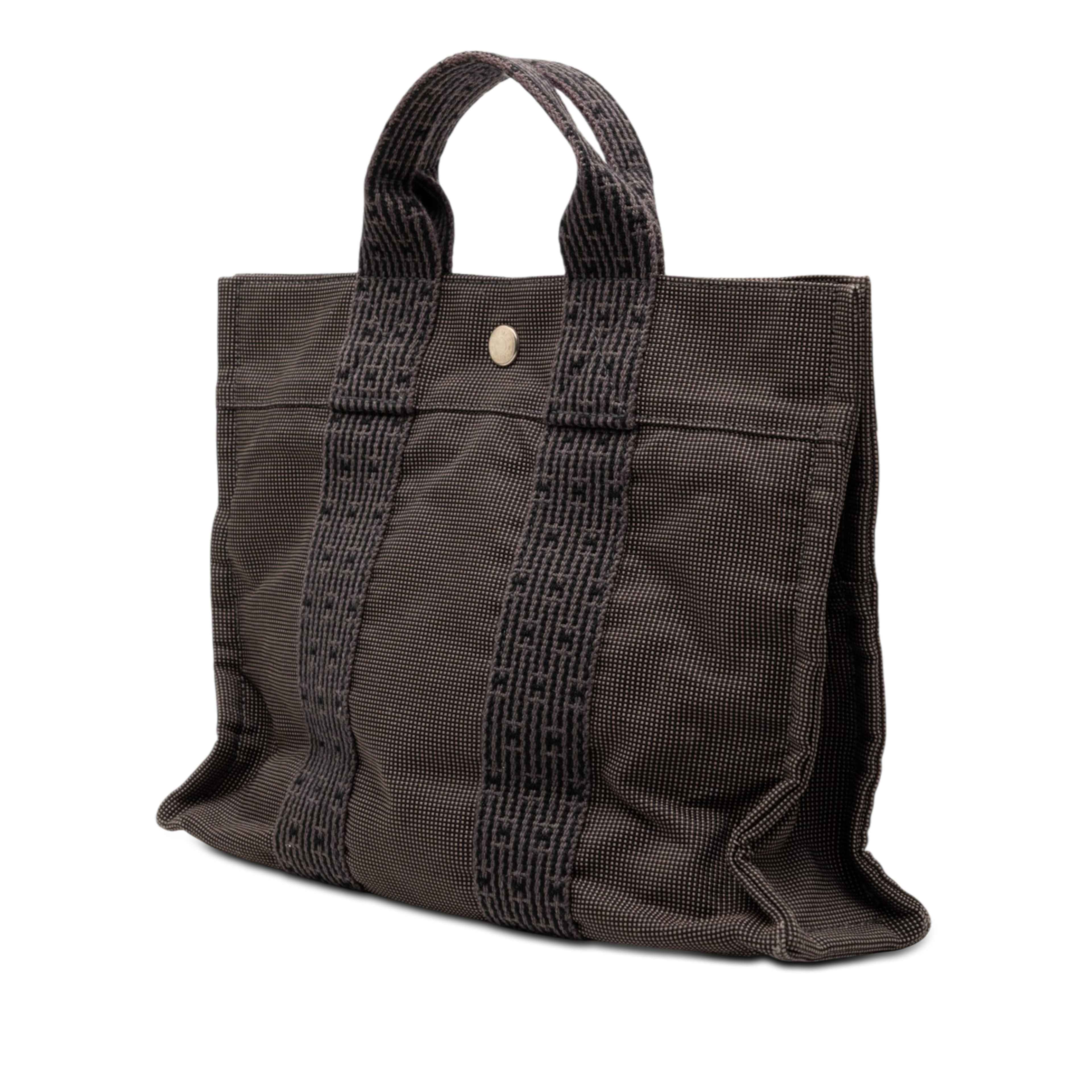 Hermès Canvas Herline Pm, från Luxclusif, i färgen dark gray. Klicka för att öppna bilden i stort format