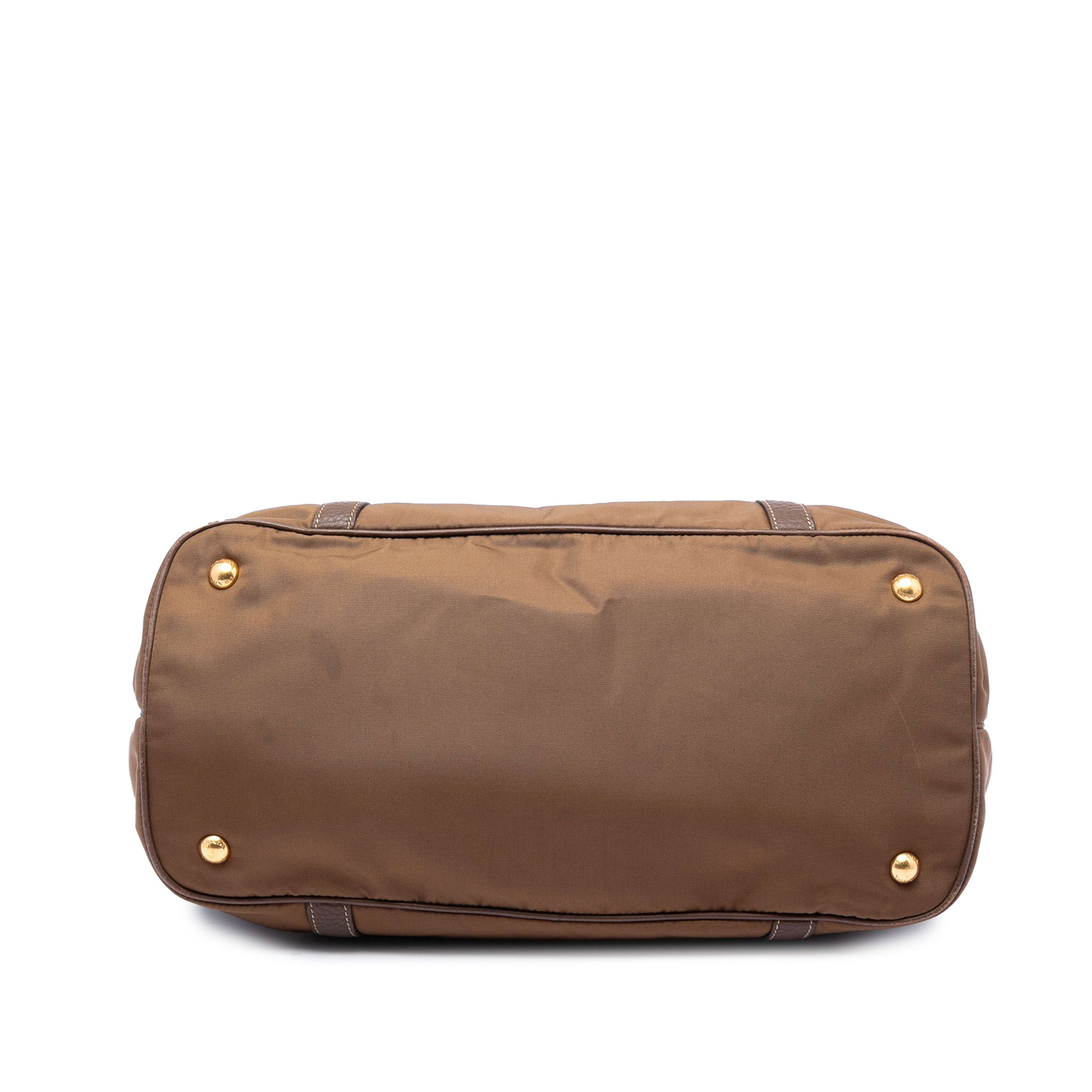 Prada Vitello Daino Trimmed Tessuto Satchel, från Luxclusif, i färgen brown. Klicka för att öppna bilden i stort format