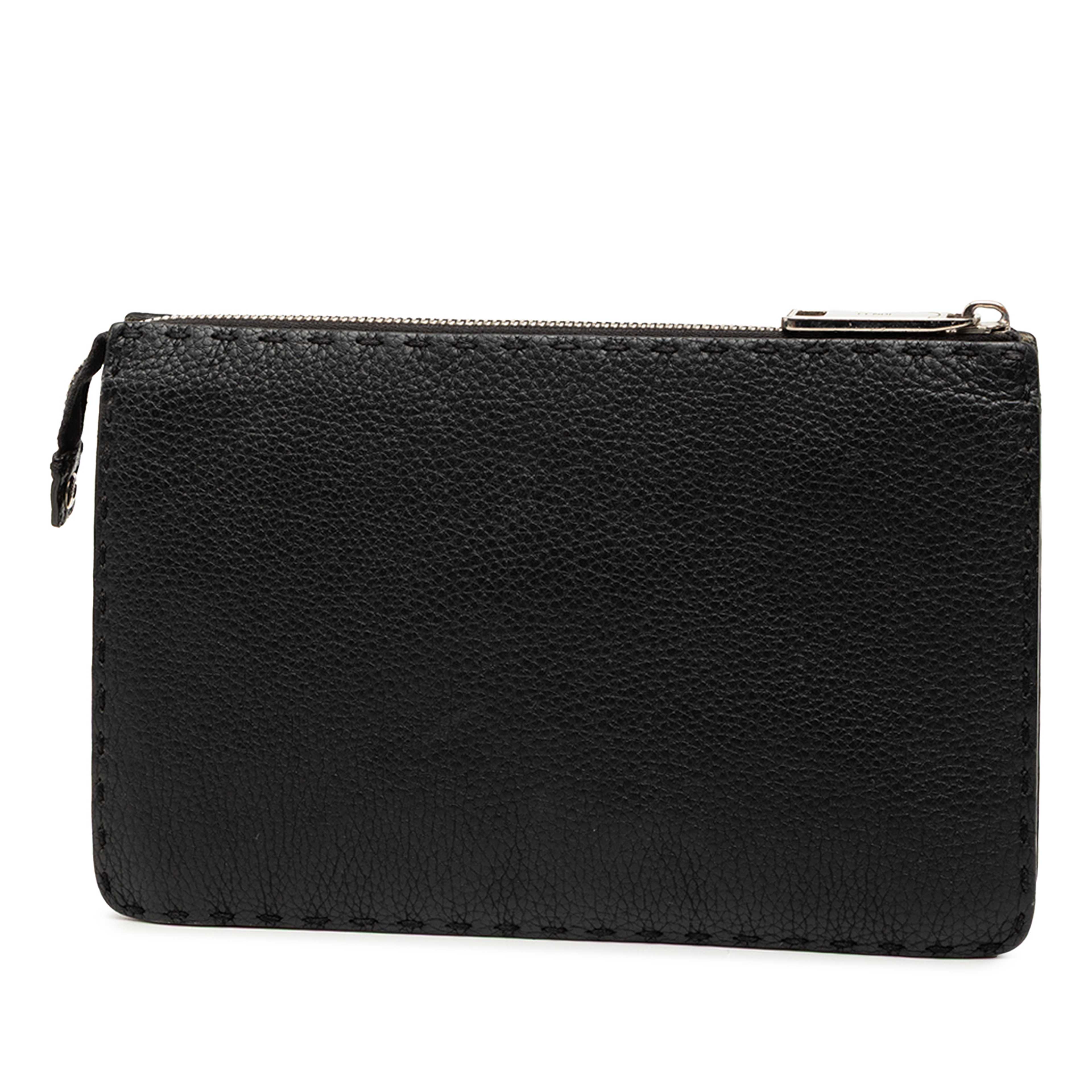 Fendi Leather Selleria Monster Clutch, från Luxclusif, i färgen black. Klicka för att öppna bilden i stort format