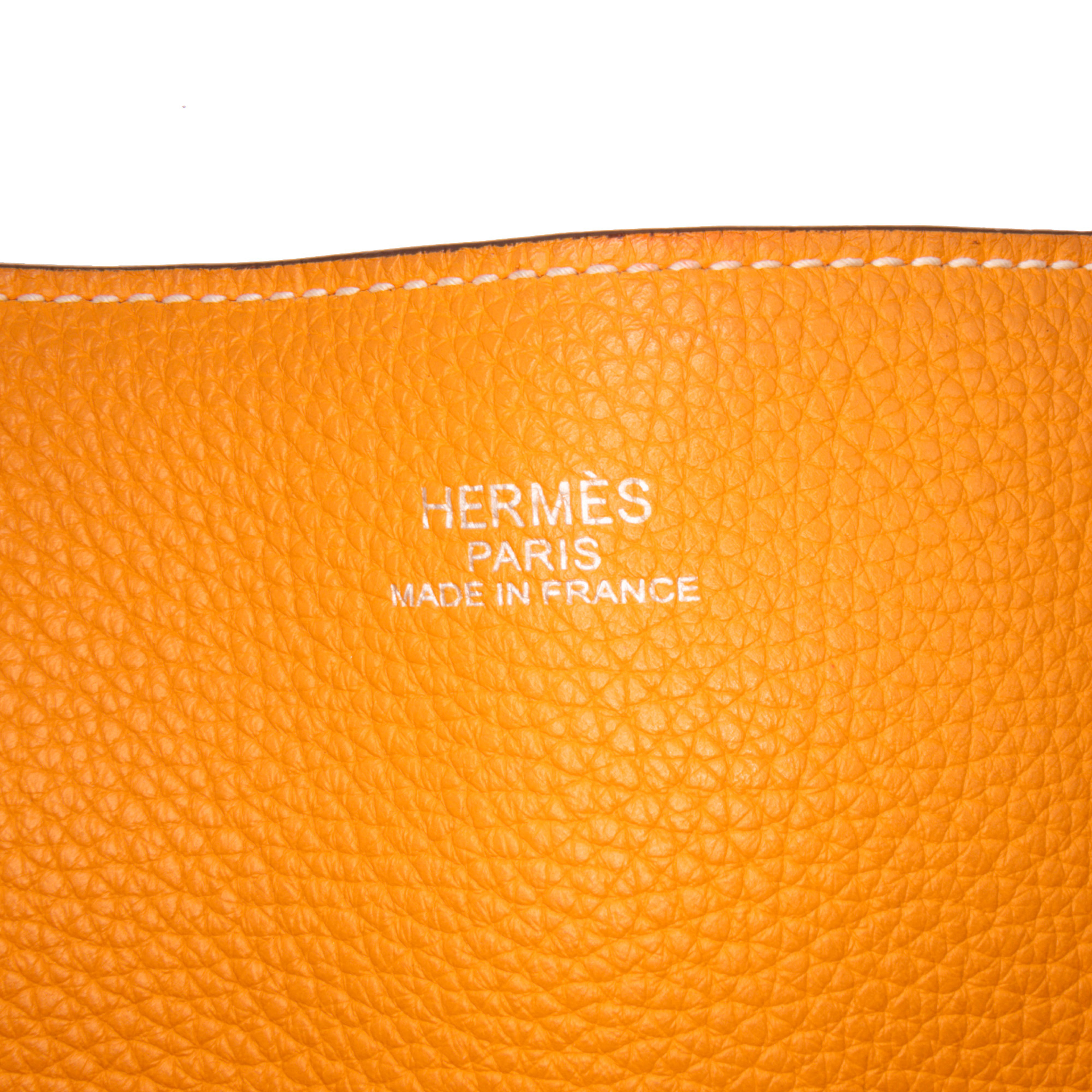 Hermès Clemence Double Sens 36, från Luxclusif, i färgen orange. Klicka för att öppna bilden i stort format