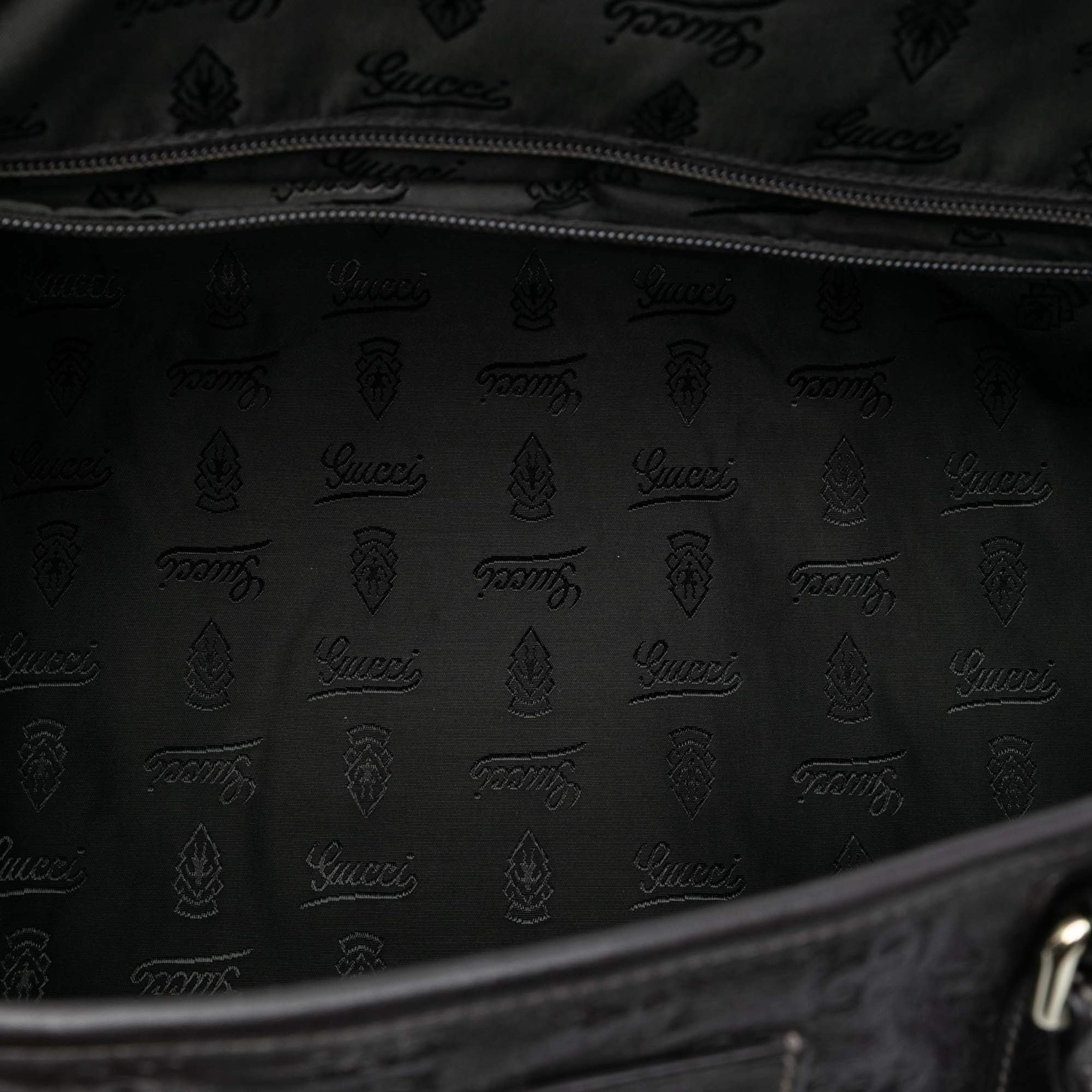 Gucci Guccissima Weekender, från Luxclusif, i färgen dark brown. Klicka för att öppna bilden i stort format