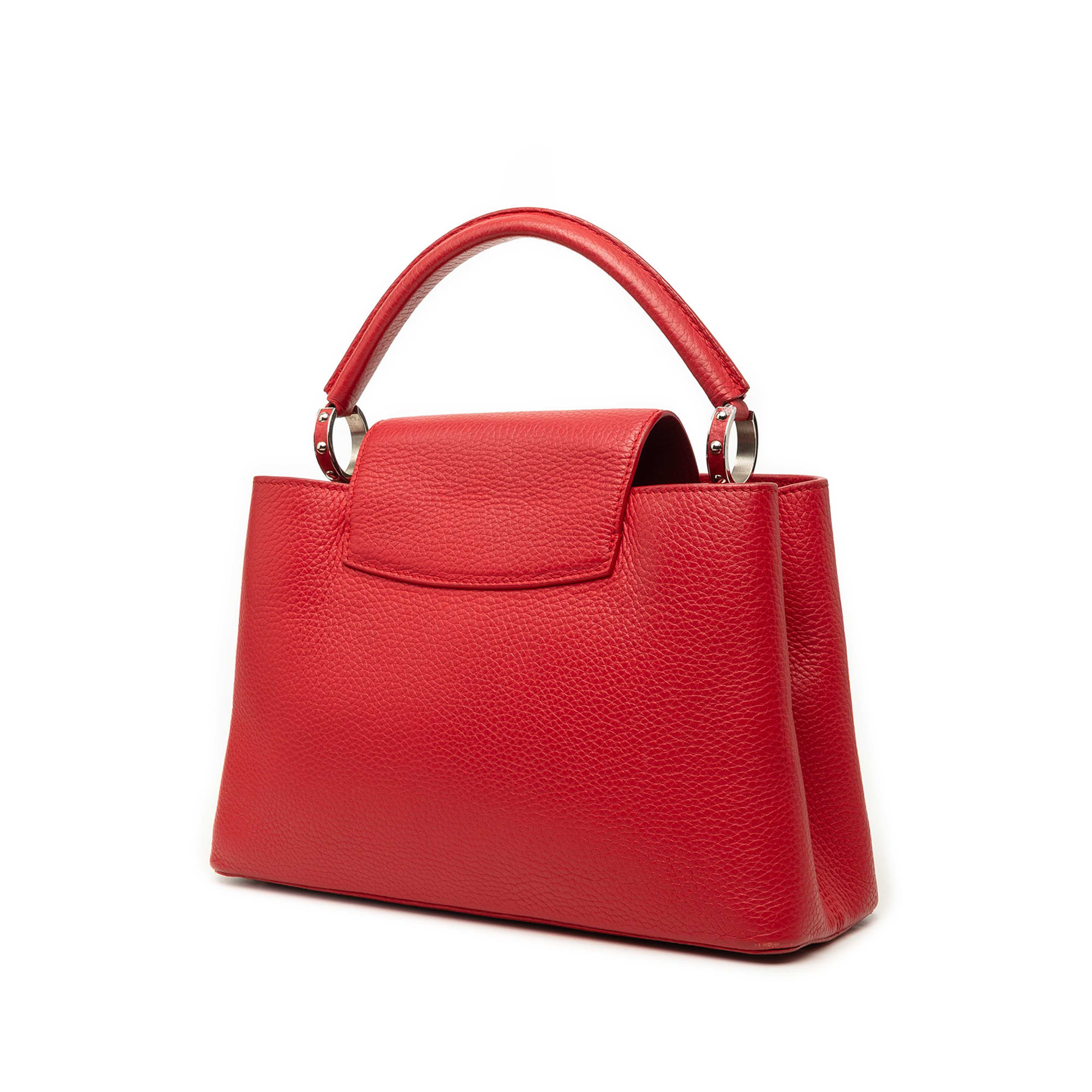 Louis Vuitton Taurillon Capucines Old Mm, från Luxclusif, i färgen röd. Klicka för att öppna bilden i stort format