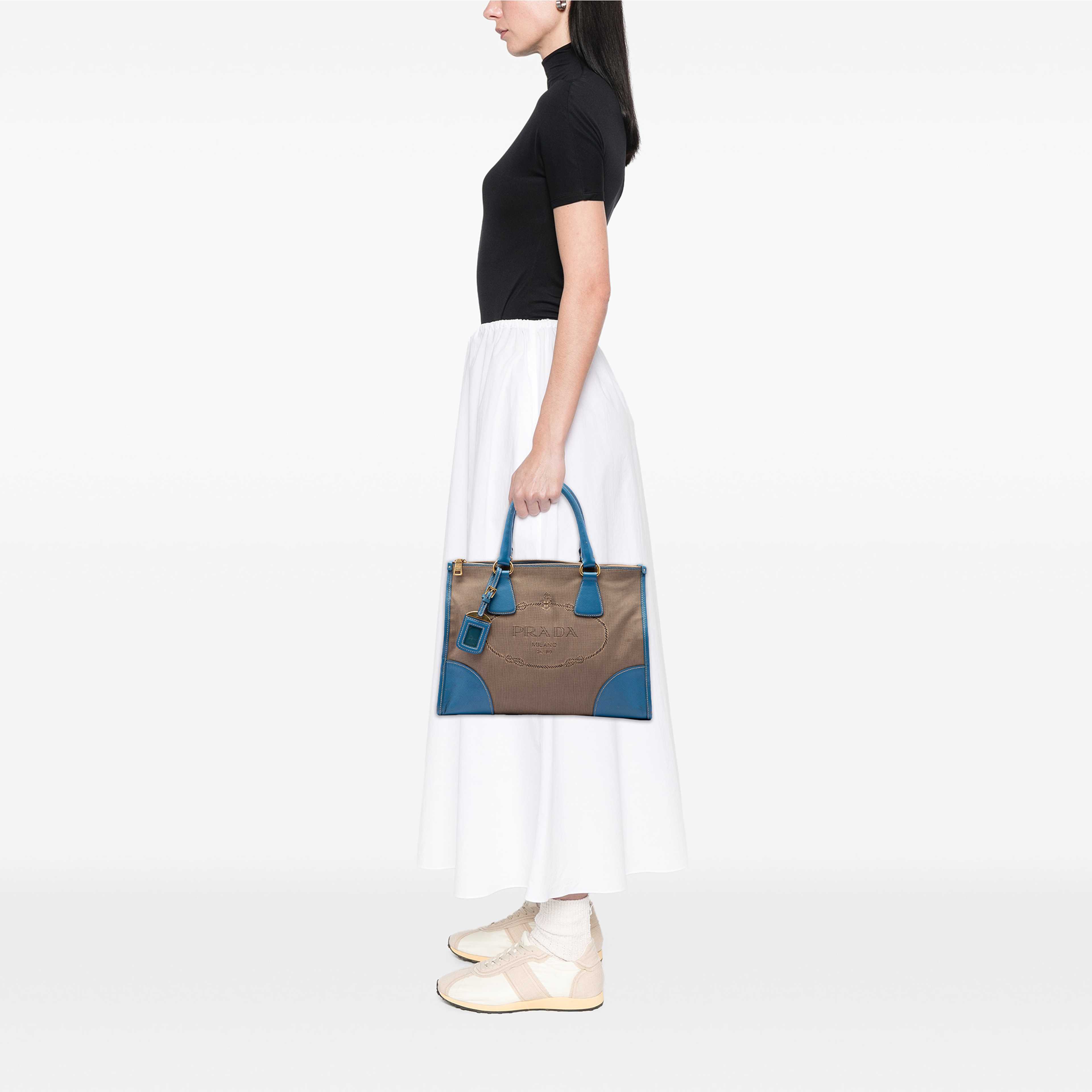Prada Saffiano Trimmed Canvas Canapa Logo Double Zip Satchel, från Luxclusif, i färgen brun. Klicka för att öppna bilden i stort format
