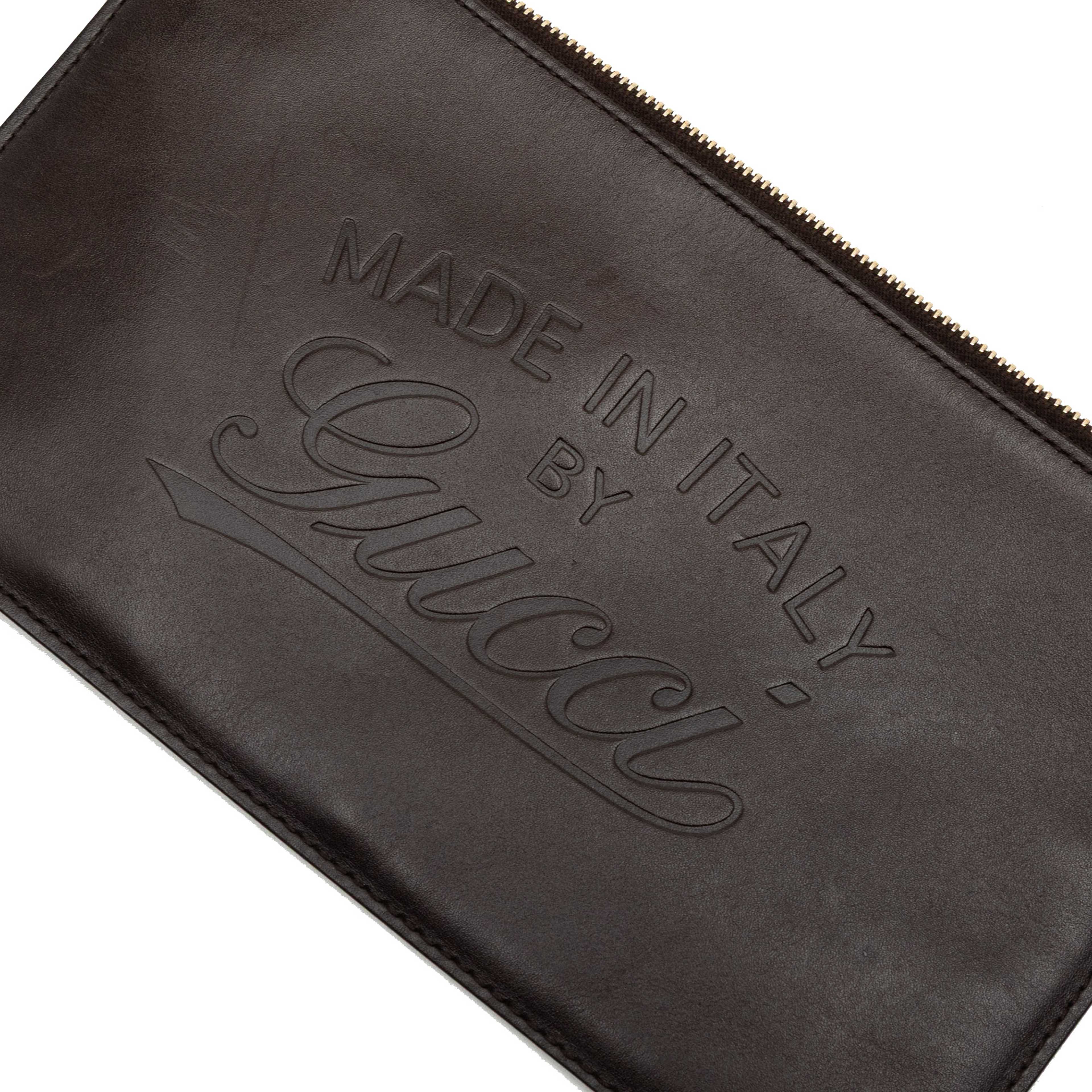 Gucci Leather Craft Pouch, från Luxclusif, i färgen dark brown. Klicka för att öppna bilden i stort format