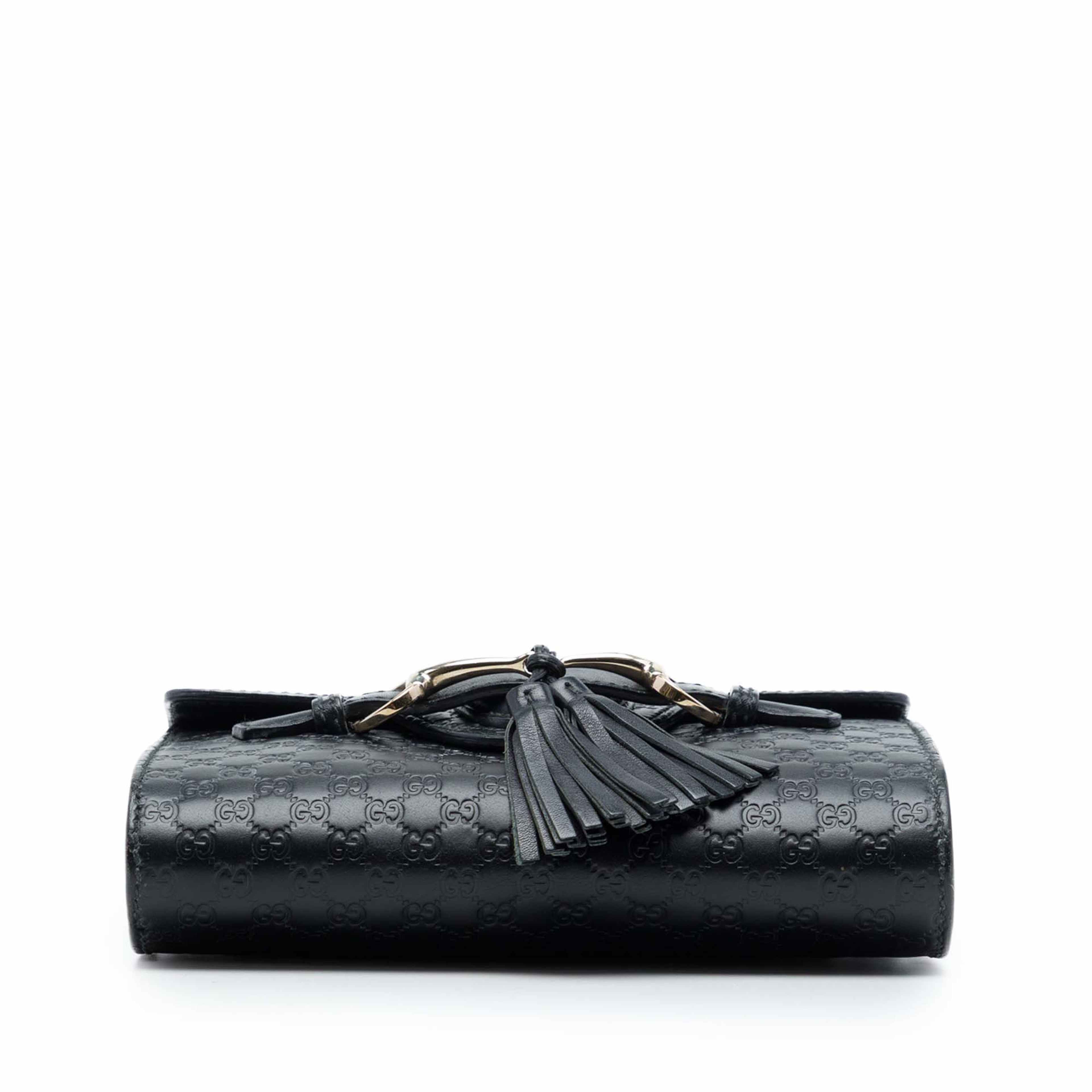 Gucci Mini Microguccissima Emily Crossbody, från Luxclusif, i färgen svart. Klicka för att öppna bilden i stort format