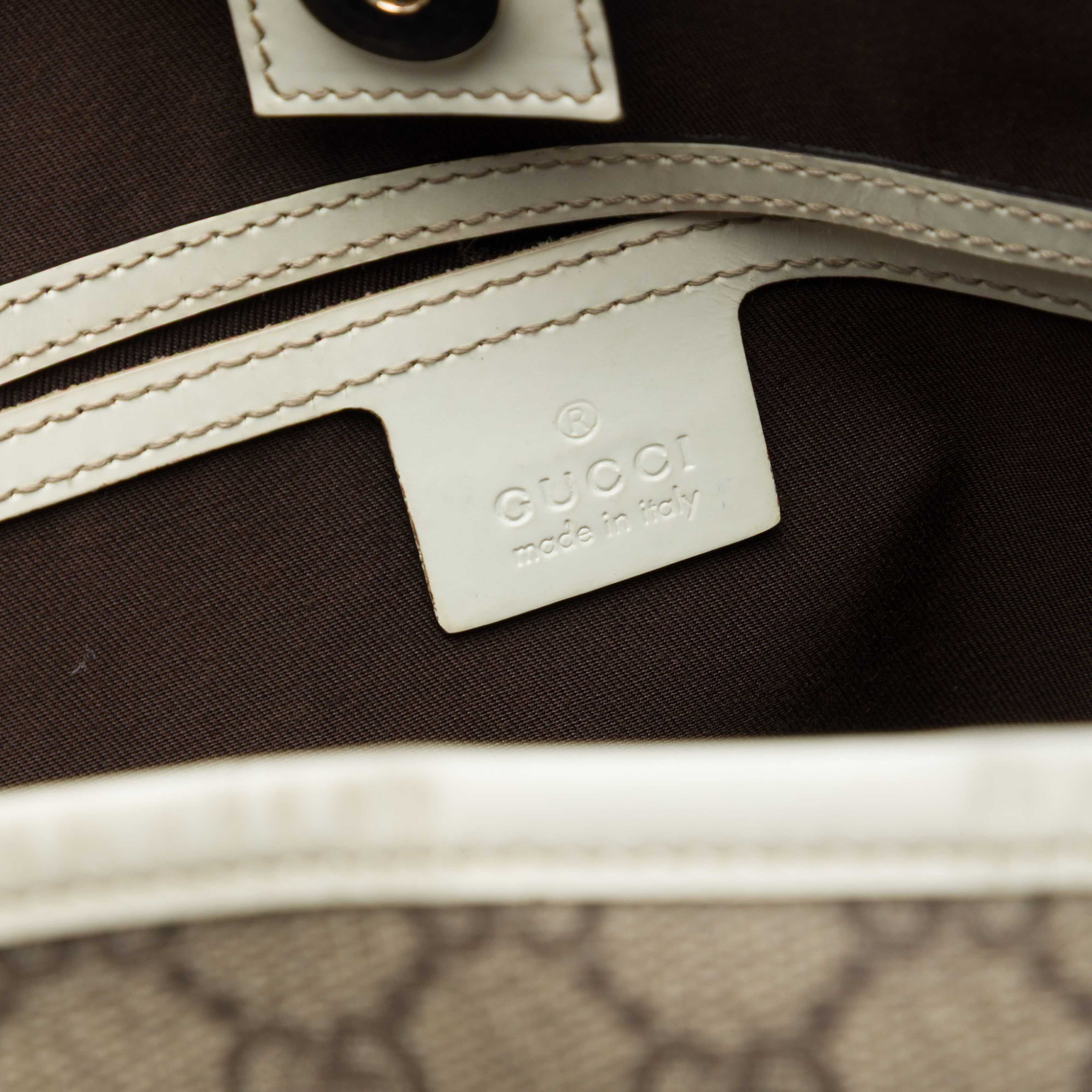 Gucci Medium Gg Supreme Joy Tote, från Luxclusif, i färgen beige. Klicka för att öppna bilden i stort format