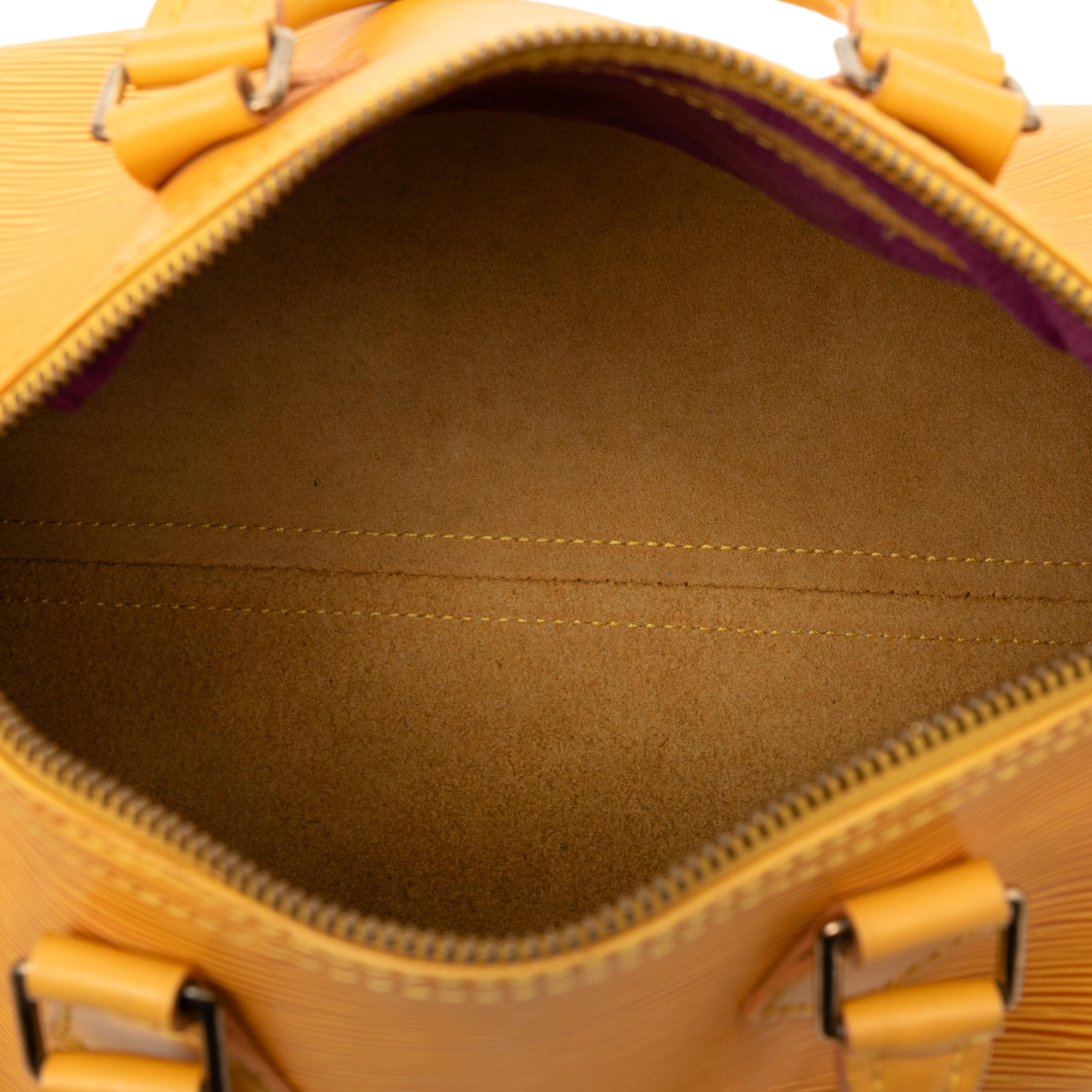 Louis Vuitton Epi Speedy 25, från Luxclusif, i färgen yellow. Klicka för att öppna bilden i stort format