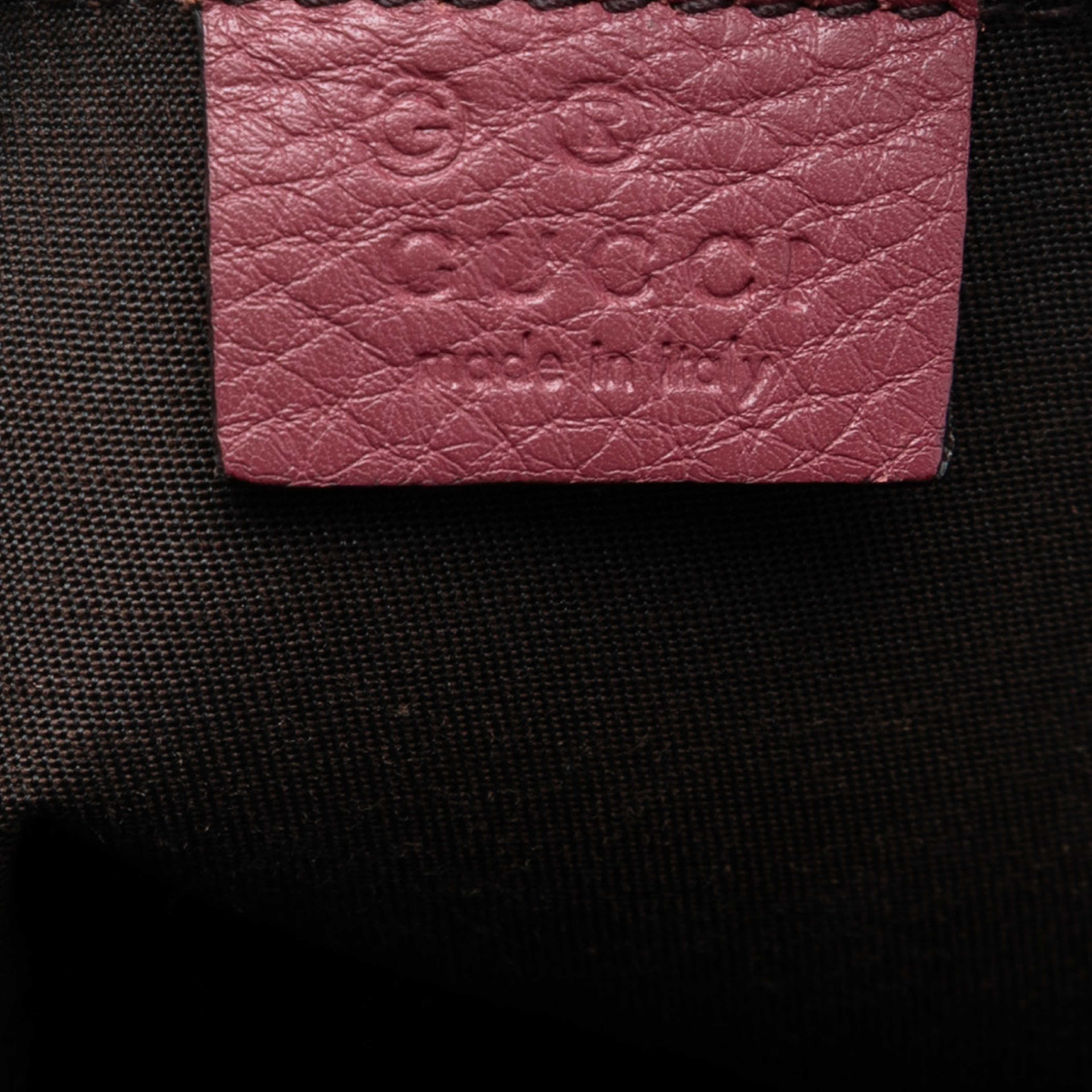 Gucci Mini Guccissima Dome Satchel, från Luxclusif, i färgen dark pink. Klicka för att öppna bilden i stort format