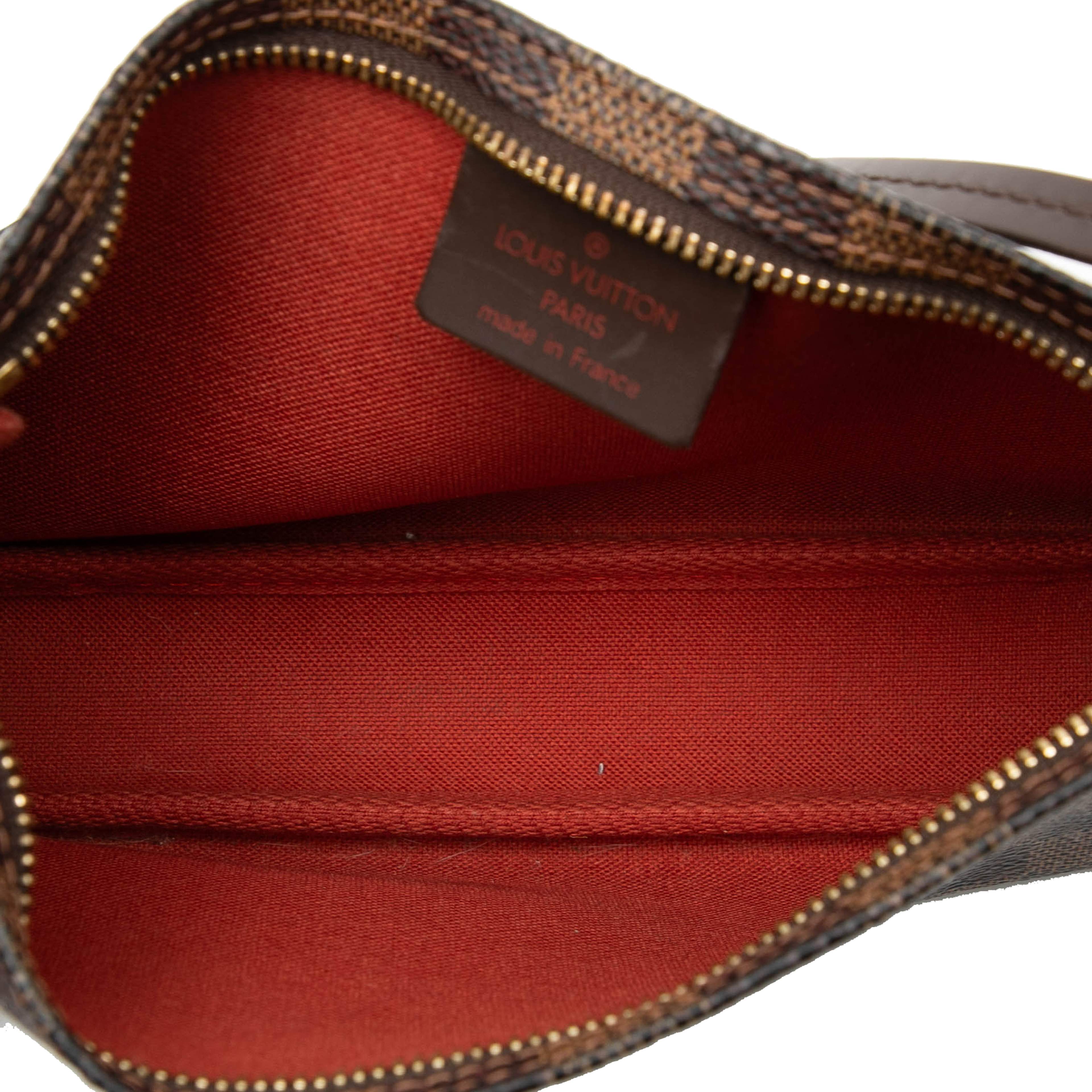 Louis Vuitton Damier Ebene Navona, från Luxclusif, i färgen brown. Klicka för att öppna bilden i stort format