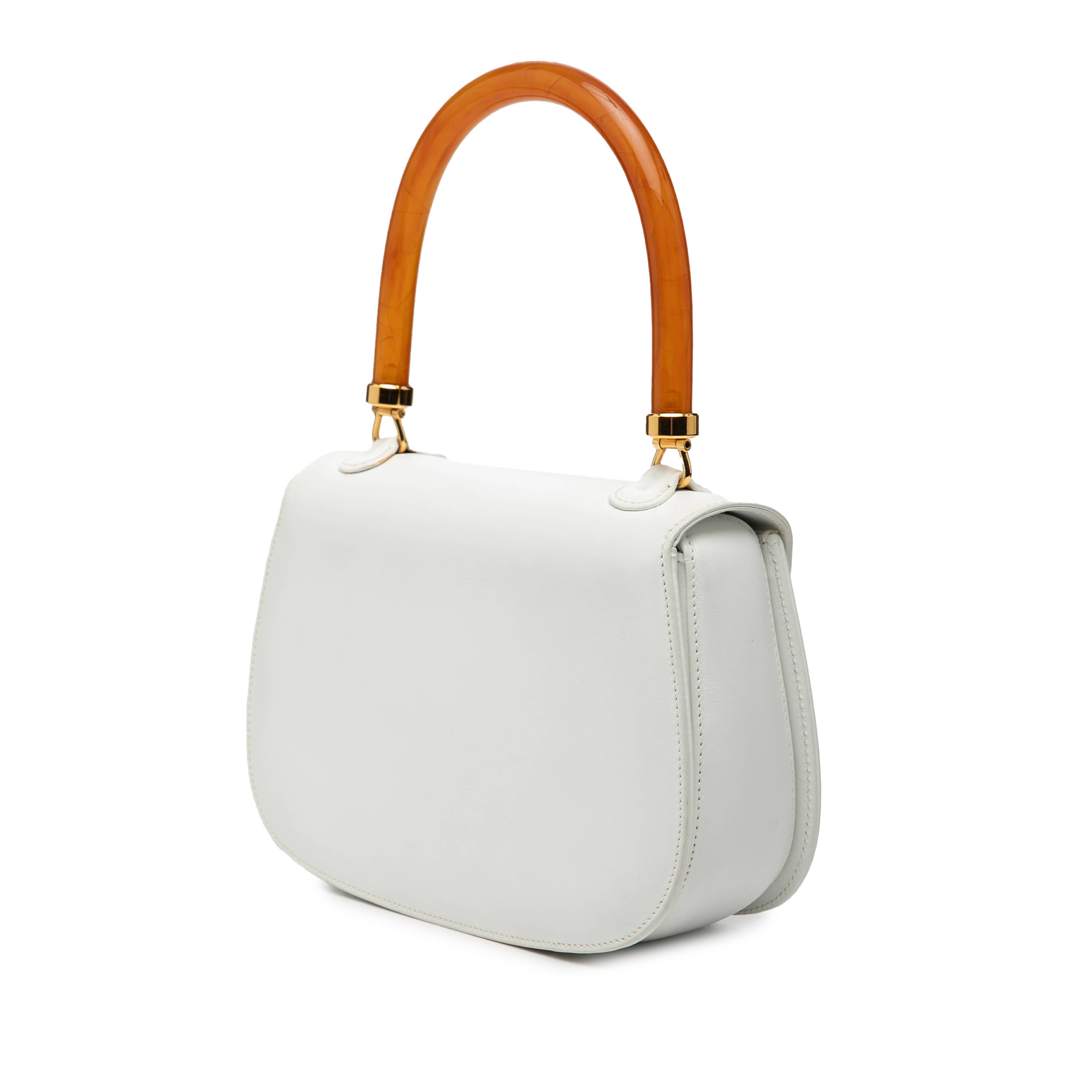 Gucci Calfskin Bakelite Night, från Luxclusif, i färgen vit. Klicka för att öppna bilden i stort format