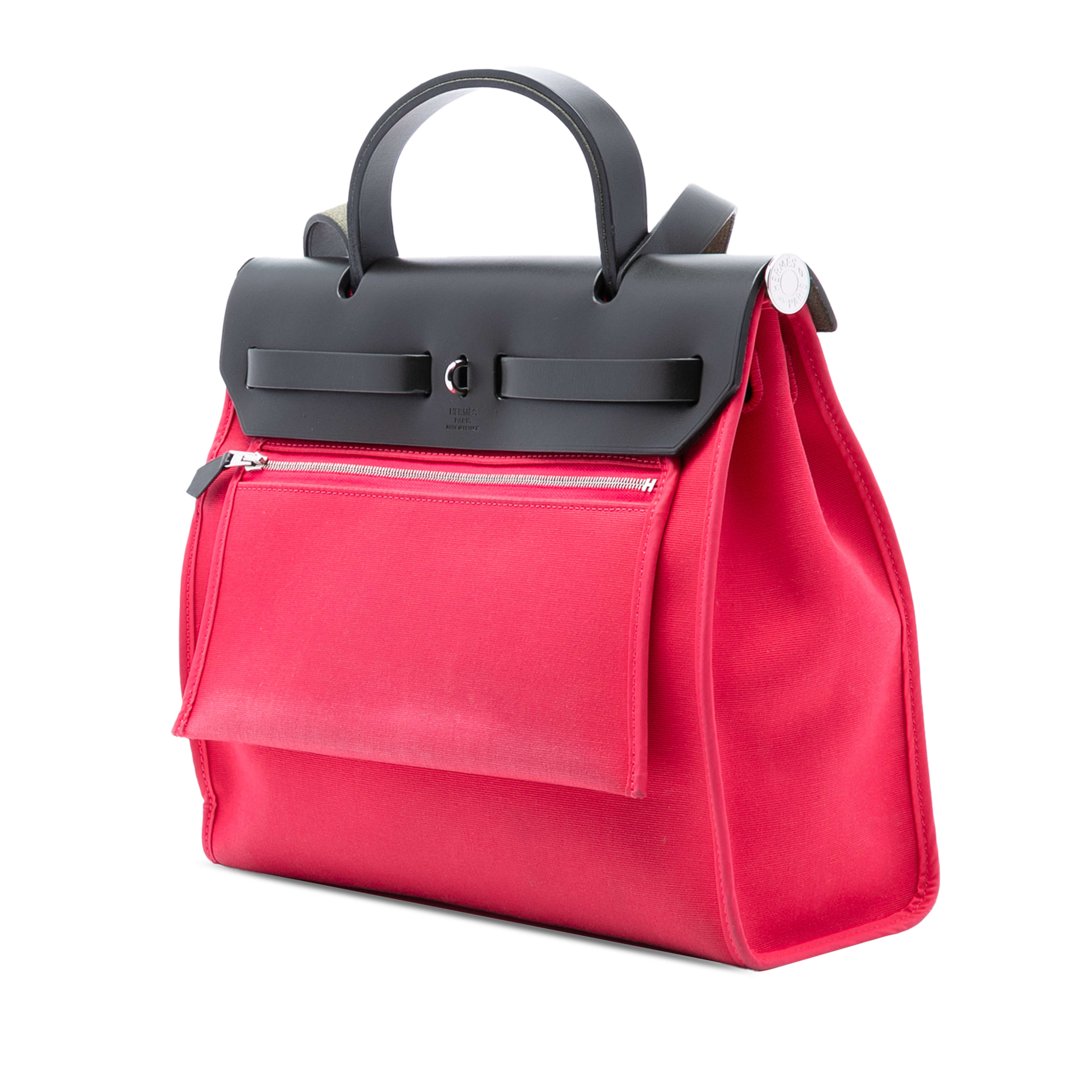 Hermès Toile Herbag Zip 31, från Luxclusif, i färgen rosa. Klicka för att öppna bilden i stort format