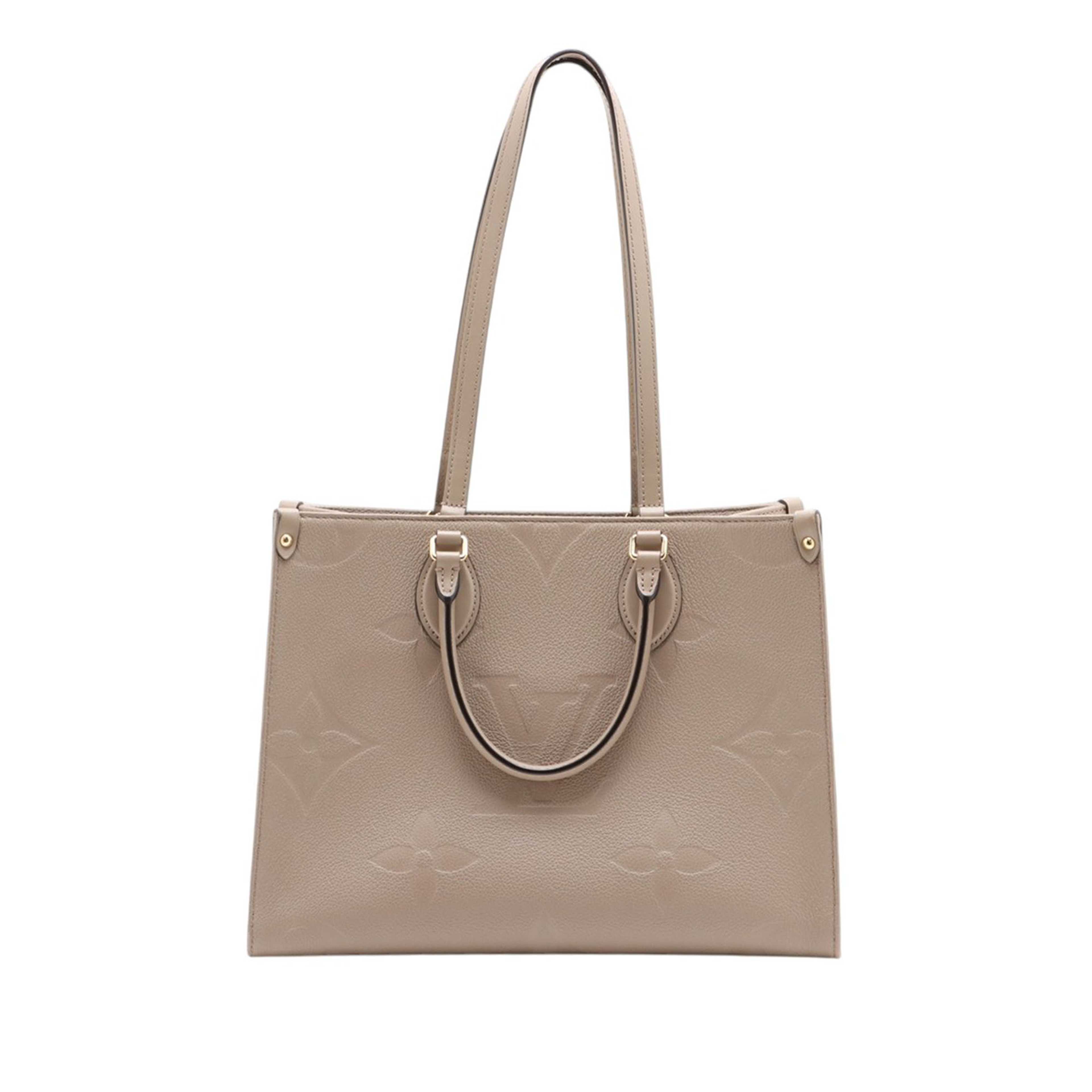 Louis Vuitton Monogram Empreinte Onthego Mm, från Luxclusif, i färgen beige. Klicka för att öppna bilden i stort format