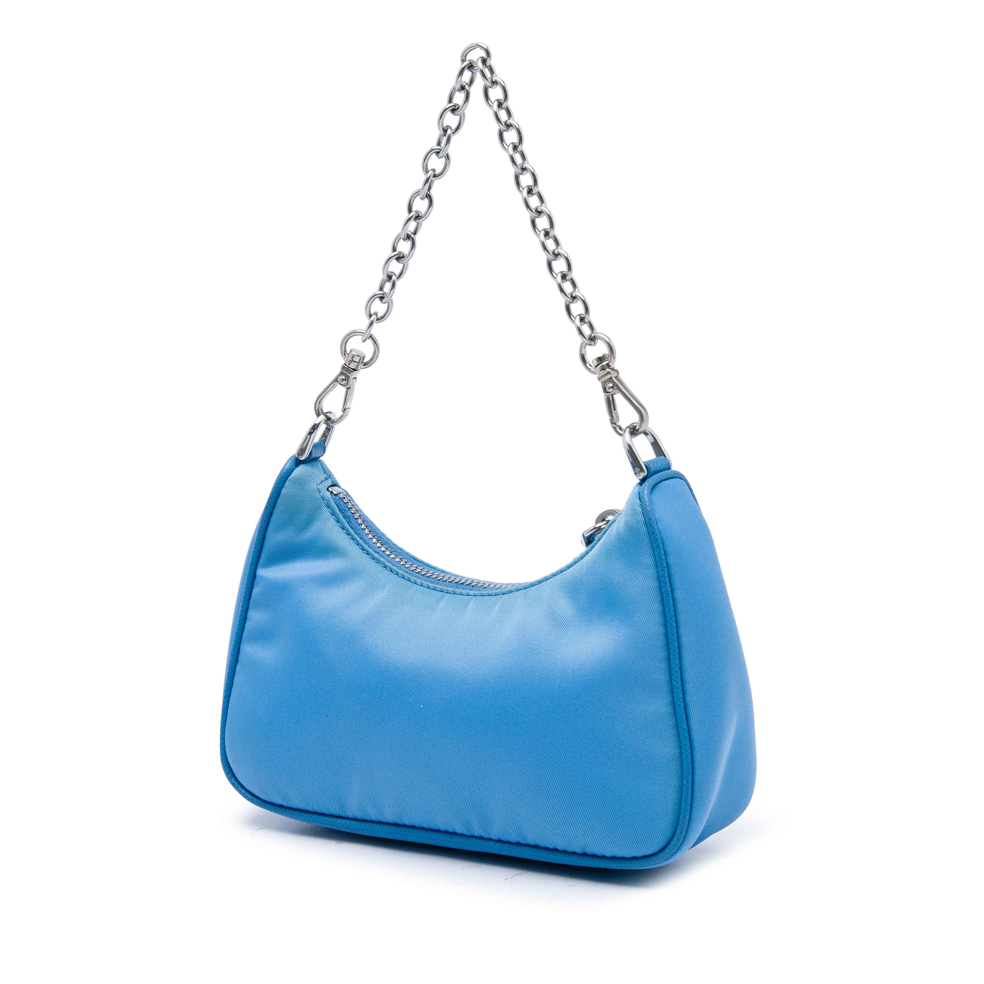 Prada Mini Saffiano Trimmed Tessuto Re Edition 2005 Satchel, från Luxclusif, i färgen blå. Klicka för att öppna bilden i stort format