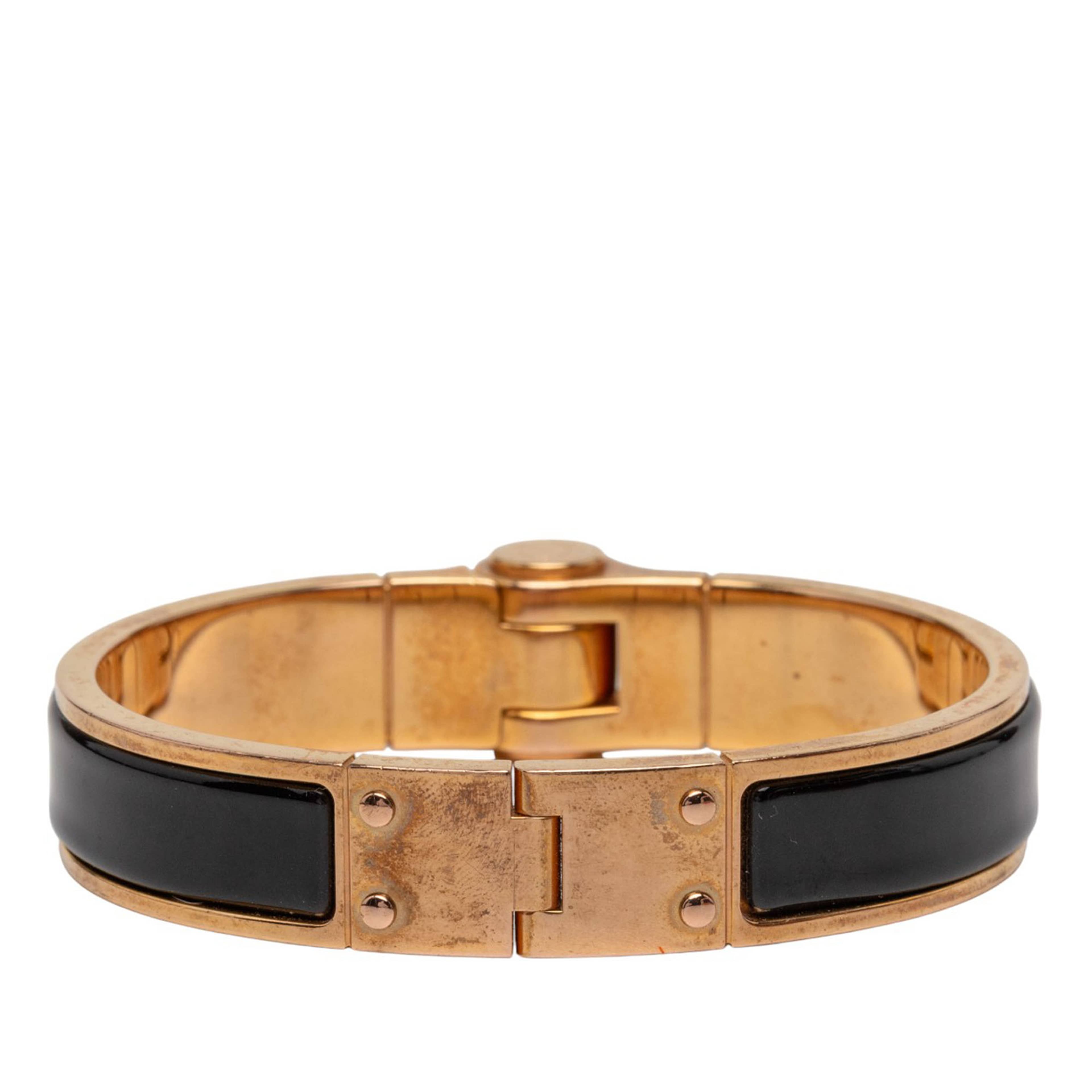 Hermès Narrow Enamel Charniere Uni Hinged Bracelet, från Luxclusif, i färgen black. Klicka för att öppna bilden i stort format