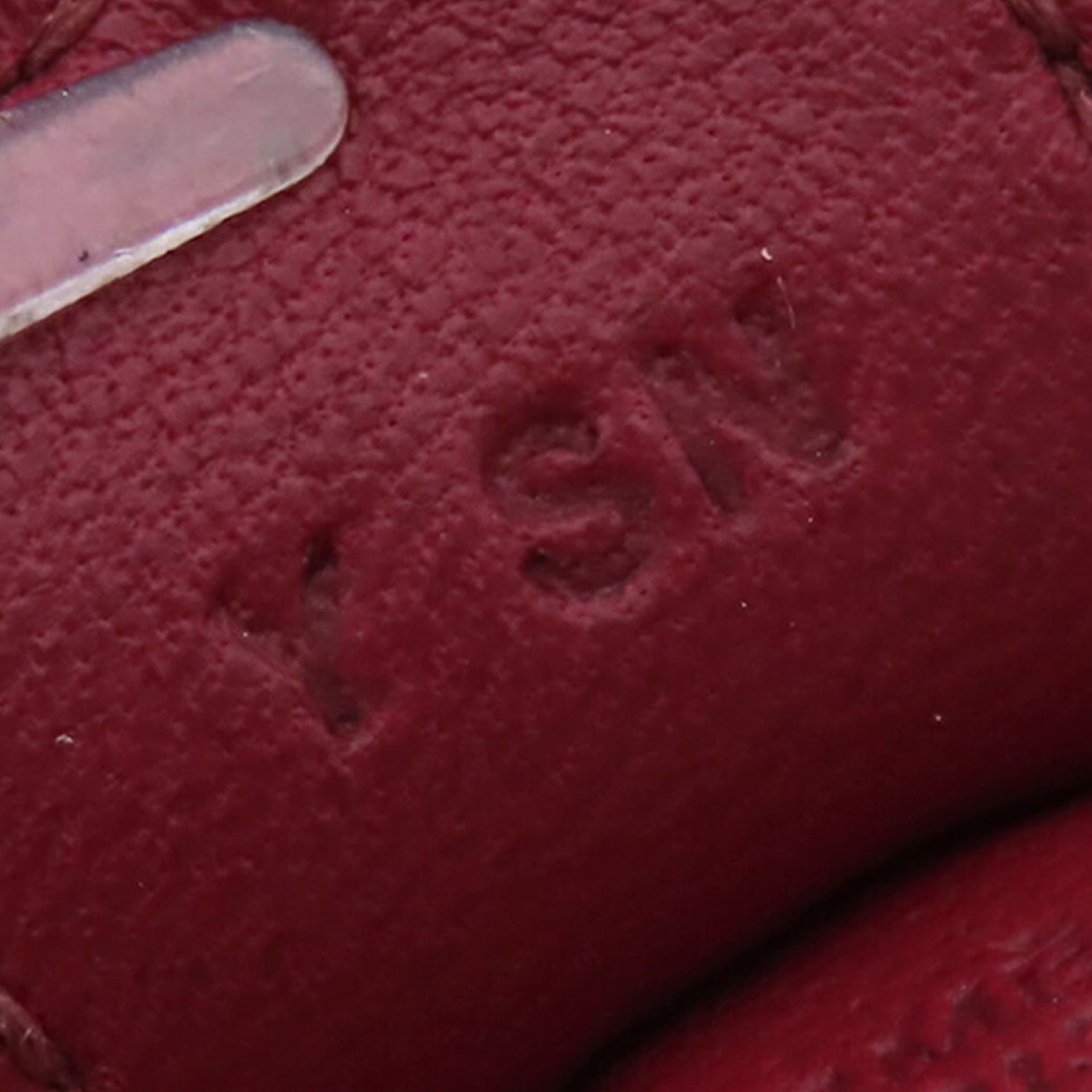 Hermès Milo Lambskin Grigri Rodeo Bag Charm Pm, från Luxclusif, i färgen dark red. Klicka för att öppna bilden i stort format